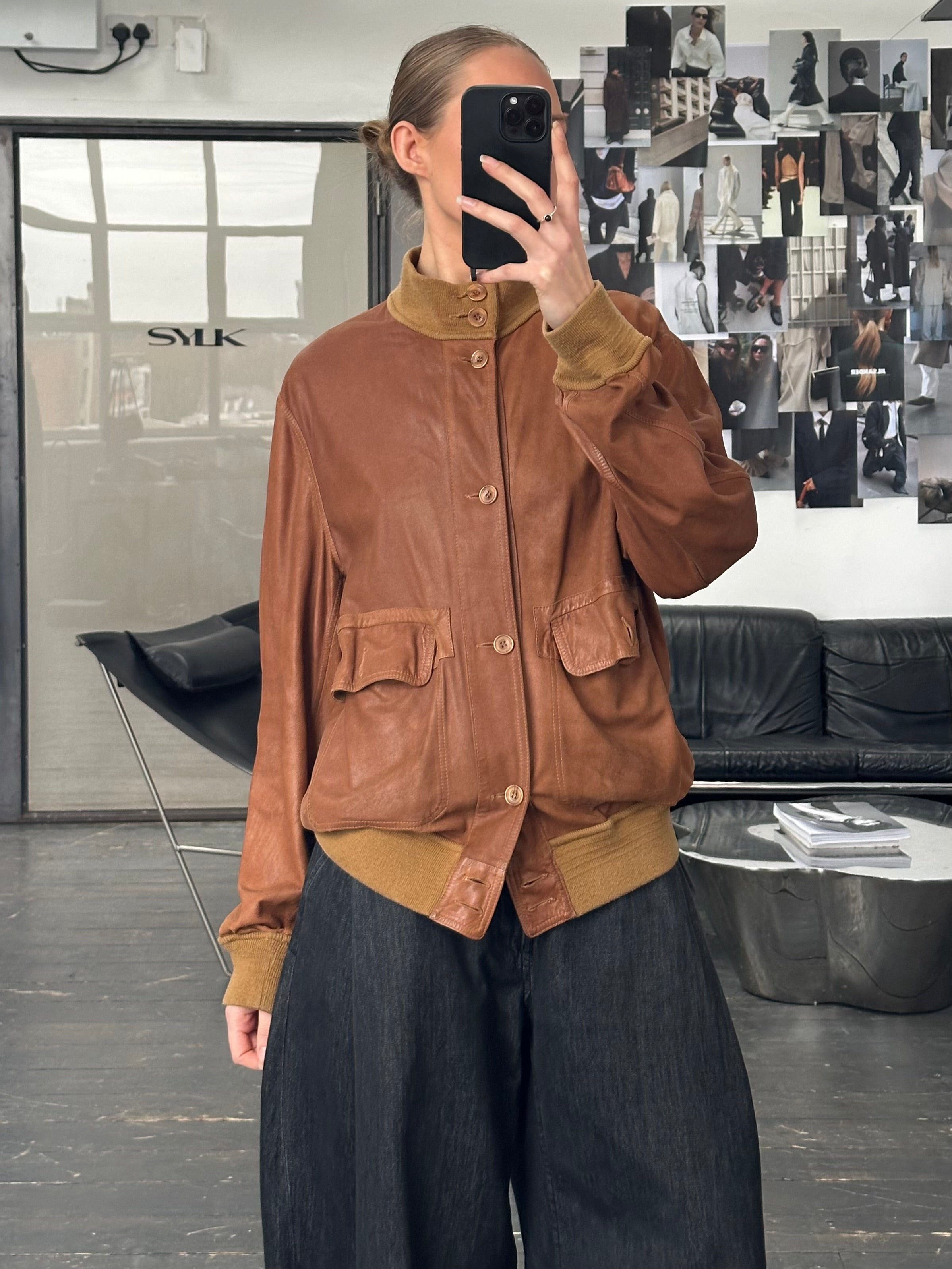 Italian Vintage 1980s reversible suede leather jacket, size large, with classic retro style and soft suede texture.