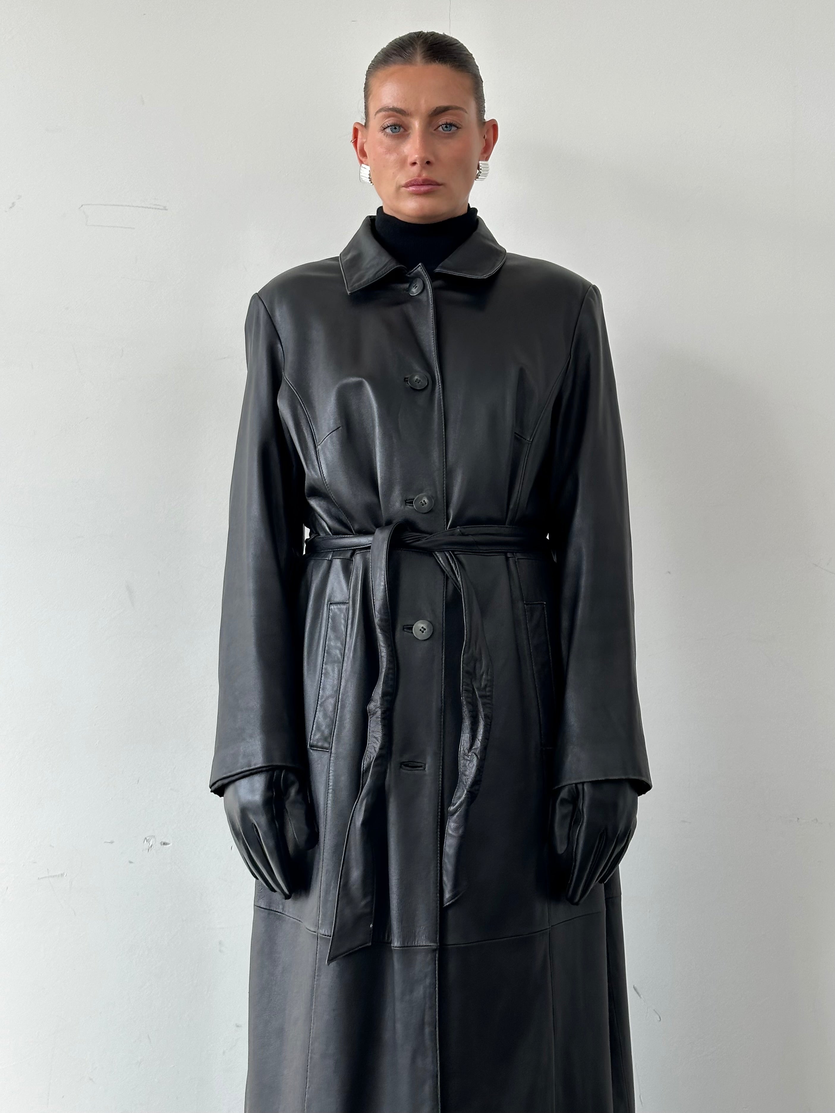 Vintage leather trench coat, floor-length belted design in size XL, stylish vintage leather jacket with classic details.