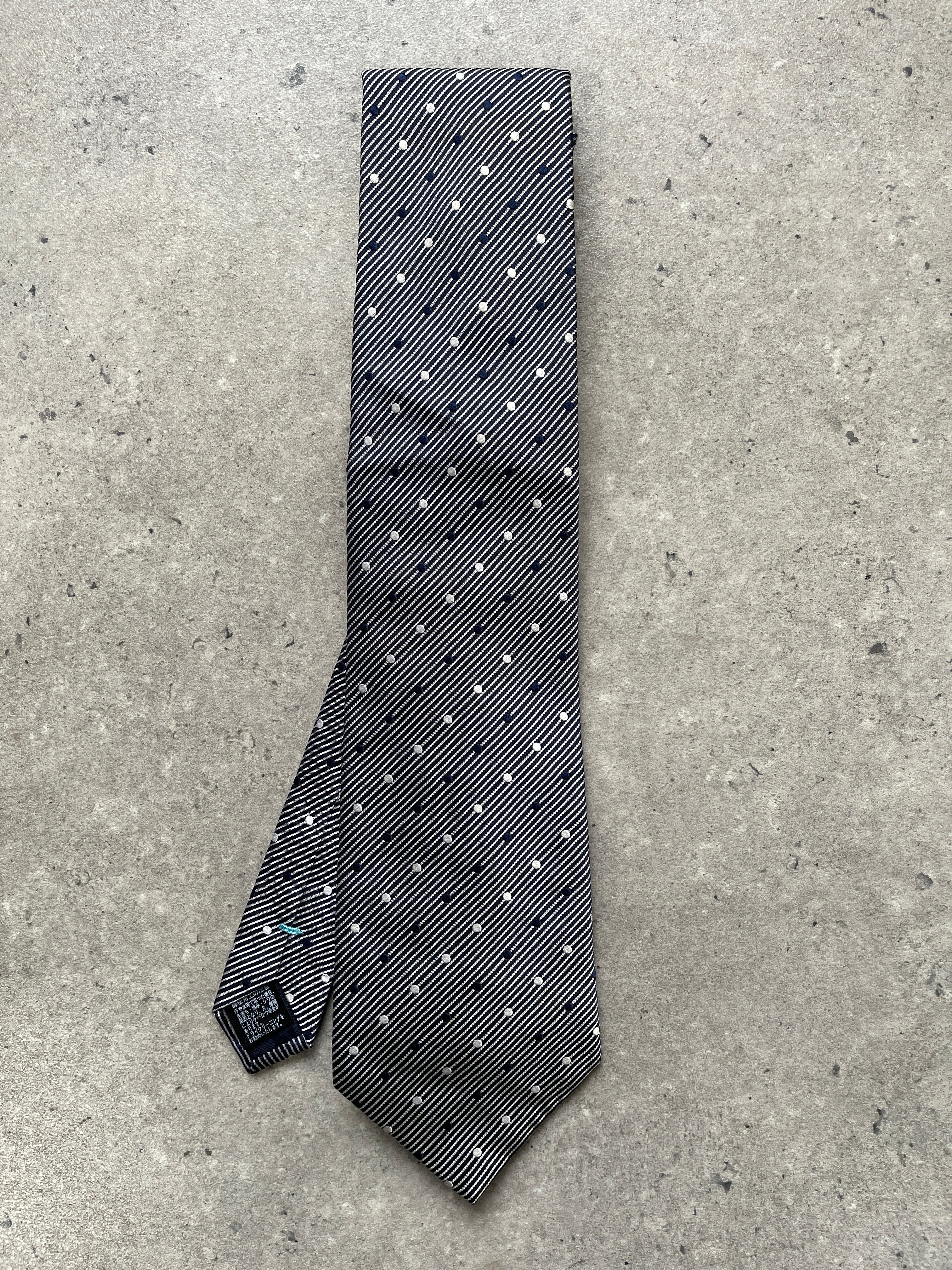 Vintage 2000s pure silk polkadot and stripe tie with classic pattern, featuring a sleek, elegant design suitable for formal wear.