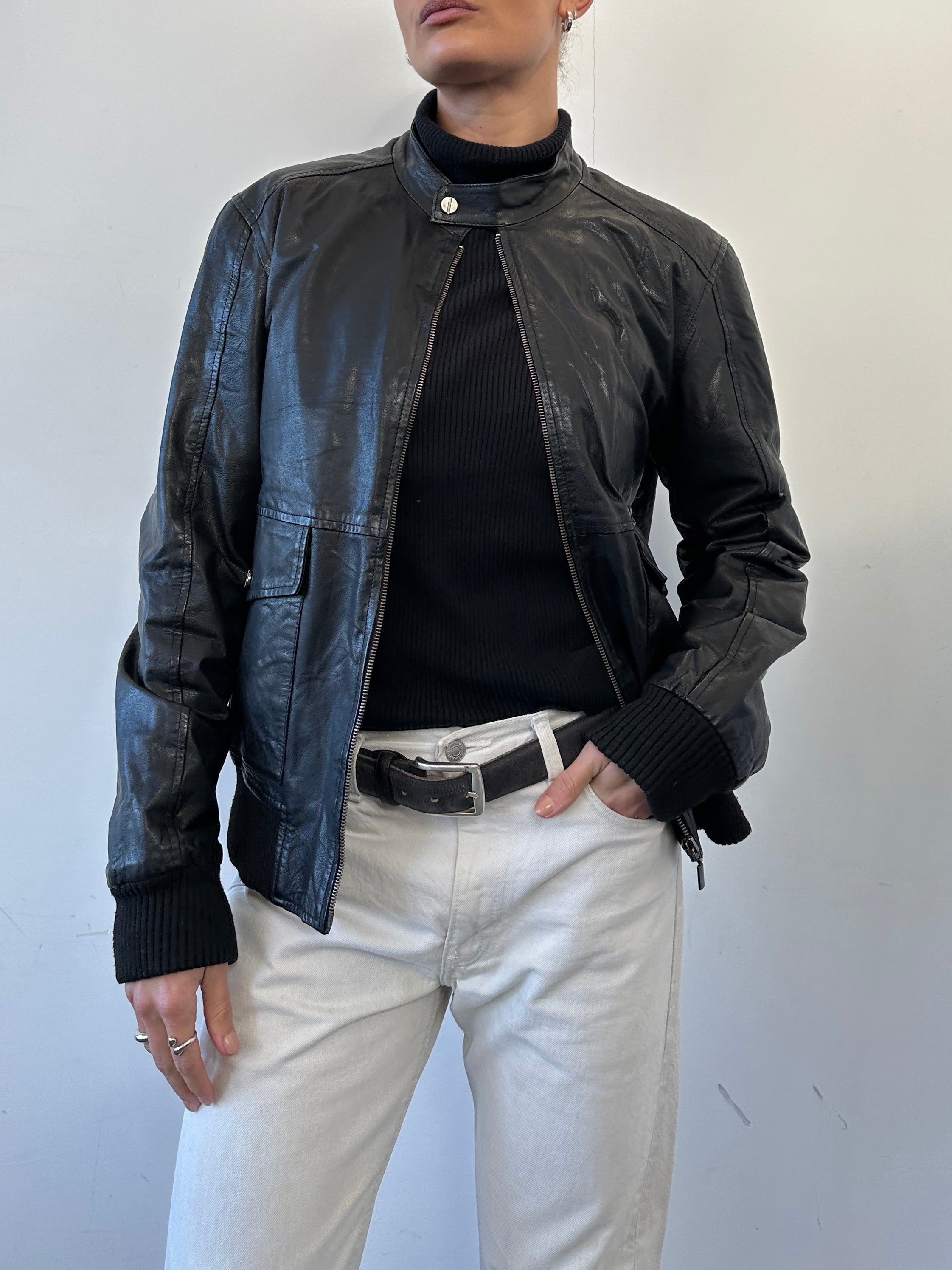 Conbipel Moto Leather Bomber Jacket in black, featuring classic collar, zip closure, and fitted design, size S/M.