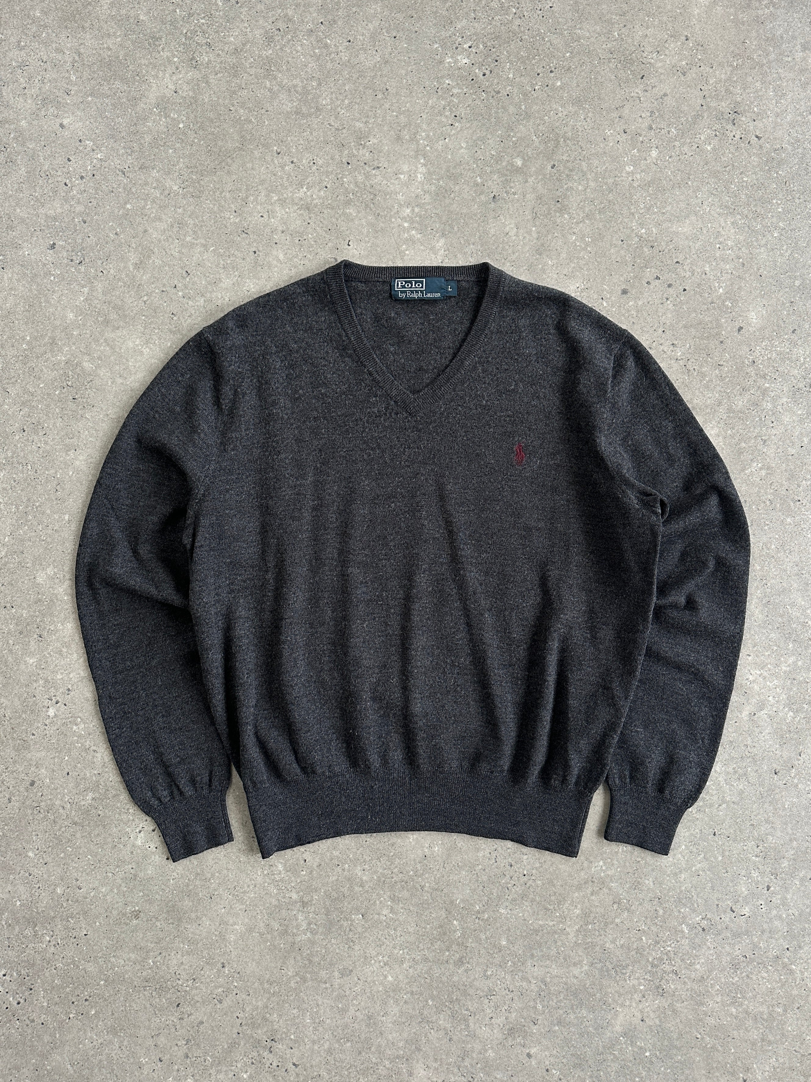 Ralph Lauren Pure Merino Wool V-Neck Jumper in size M, featuring the brand logo and a classic knit design, displayed on a mannequin.
