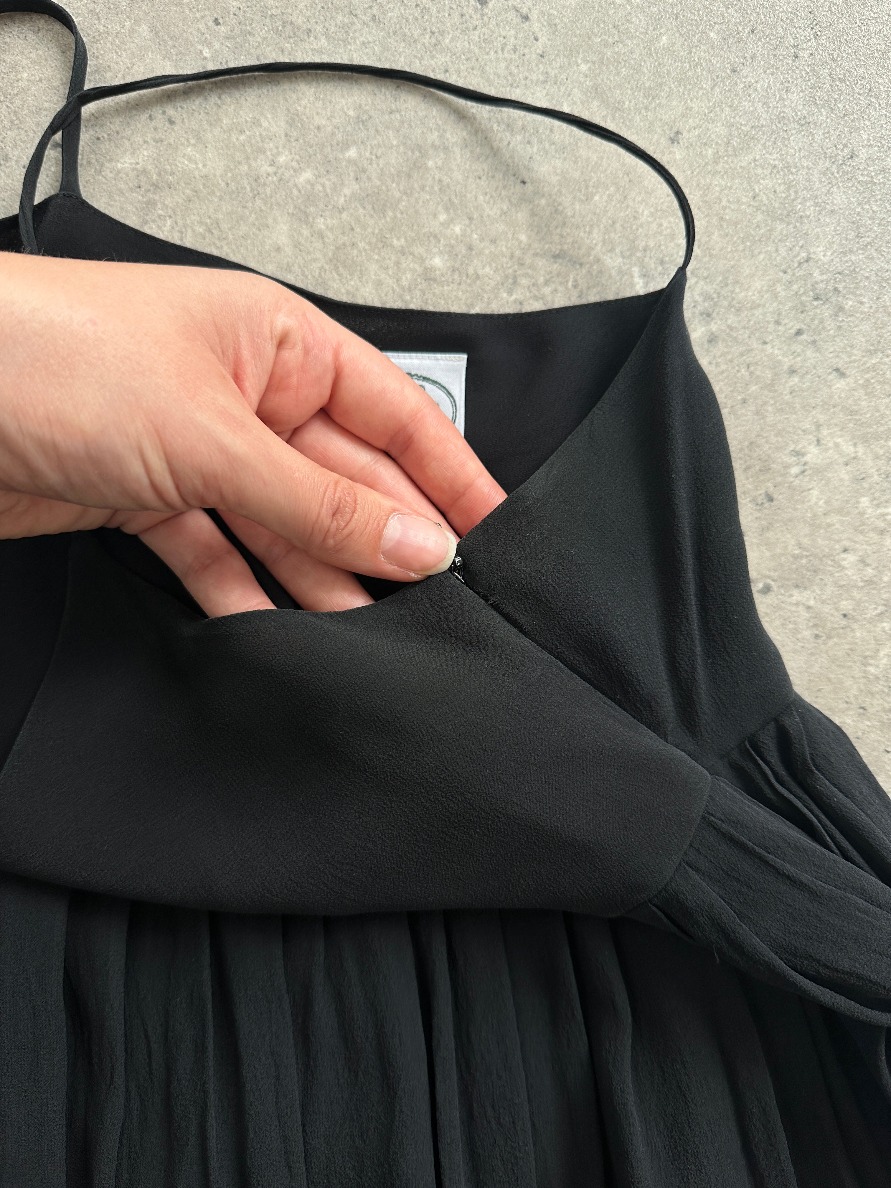 Laura Ashley pure silk pleated slip dress in XS, showcasing elegant design with a flowing silhouette and delicate pleats.