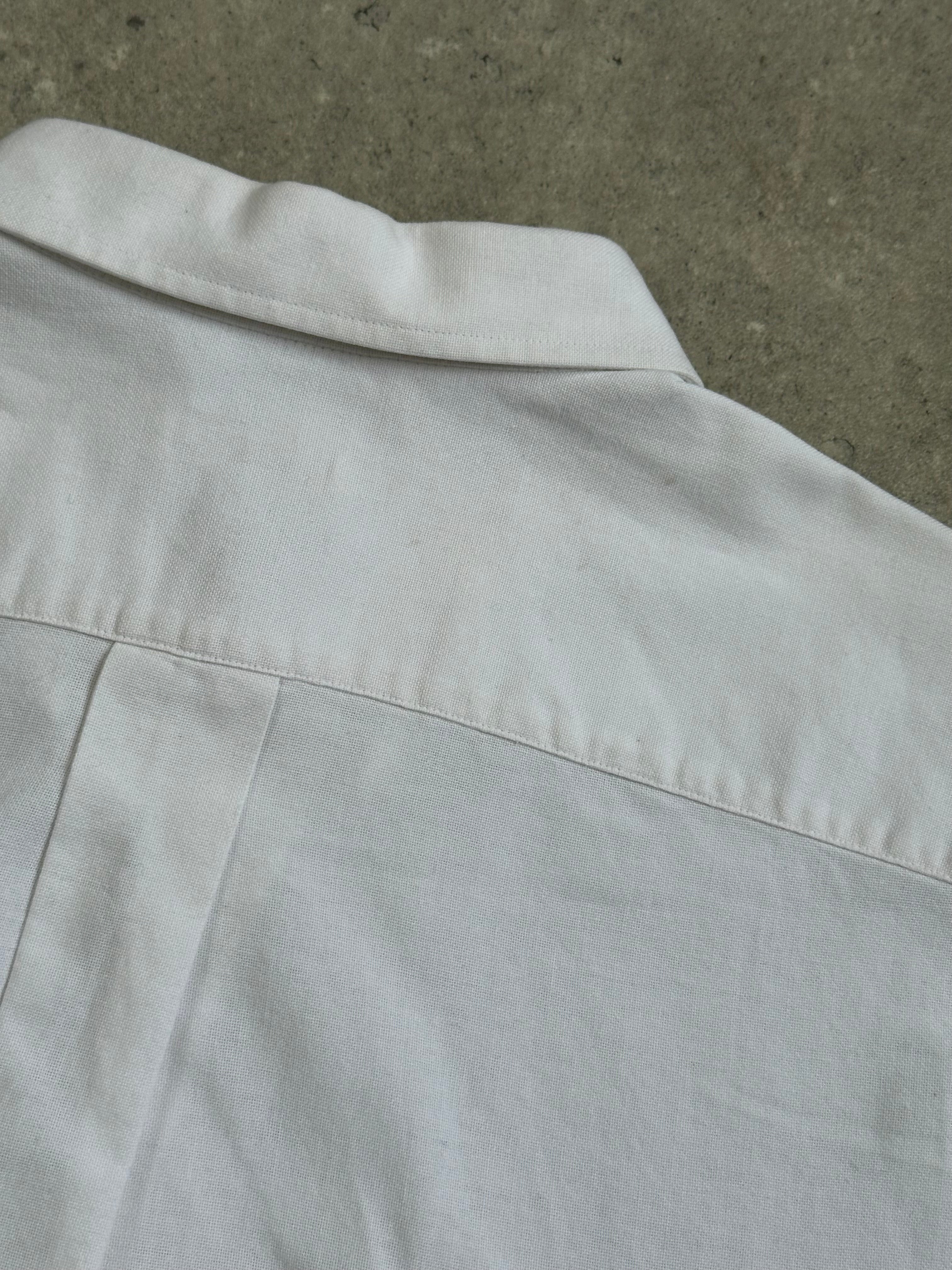 Yves Saint Laurent 1990s pure cotton shirt in size L, featuring classic button-up design and crisp white fabric.