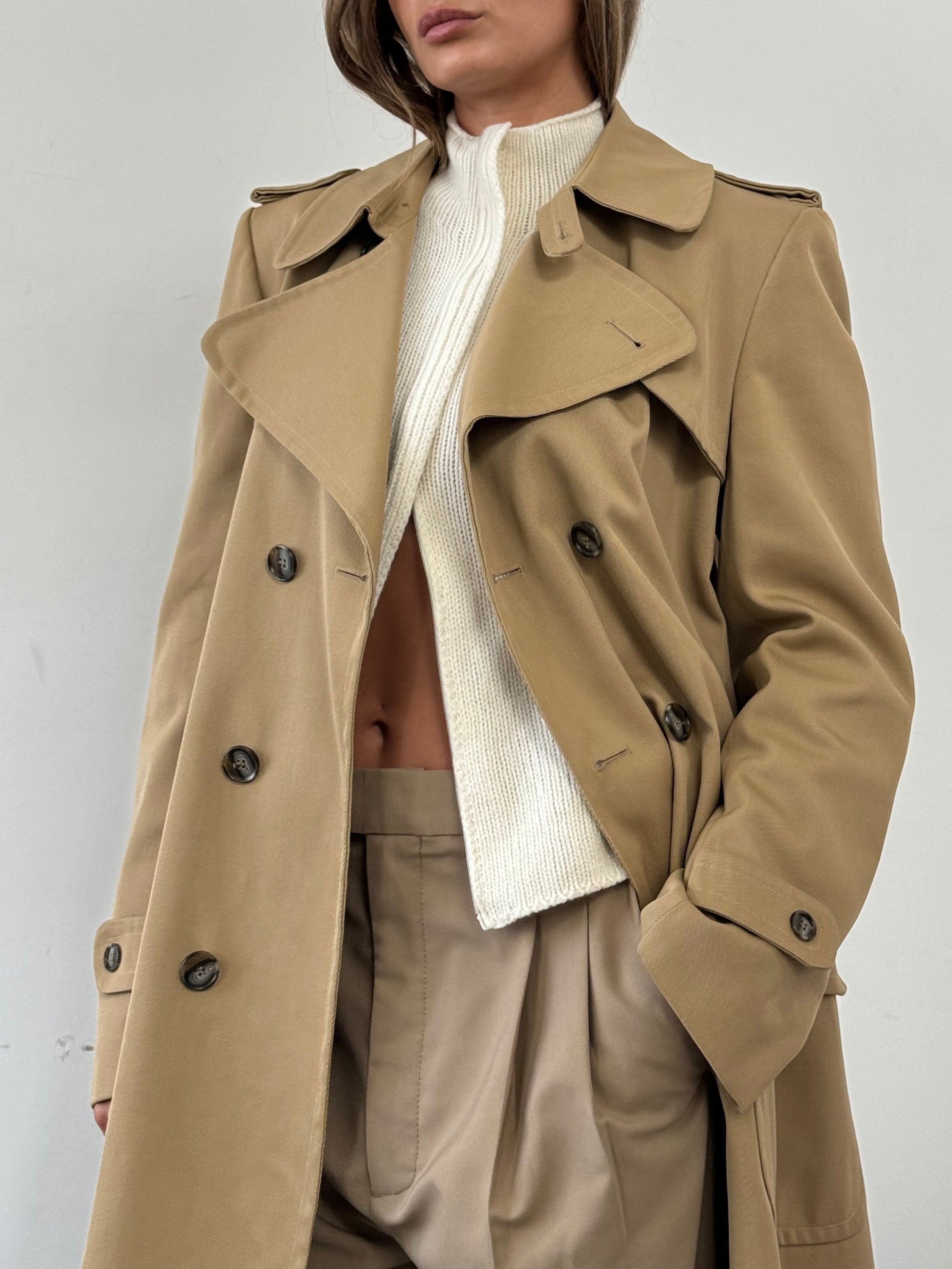 Vintage wool double-breasted trench coat in size large, featuring classic design and tailored fit, shown on a model.