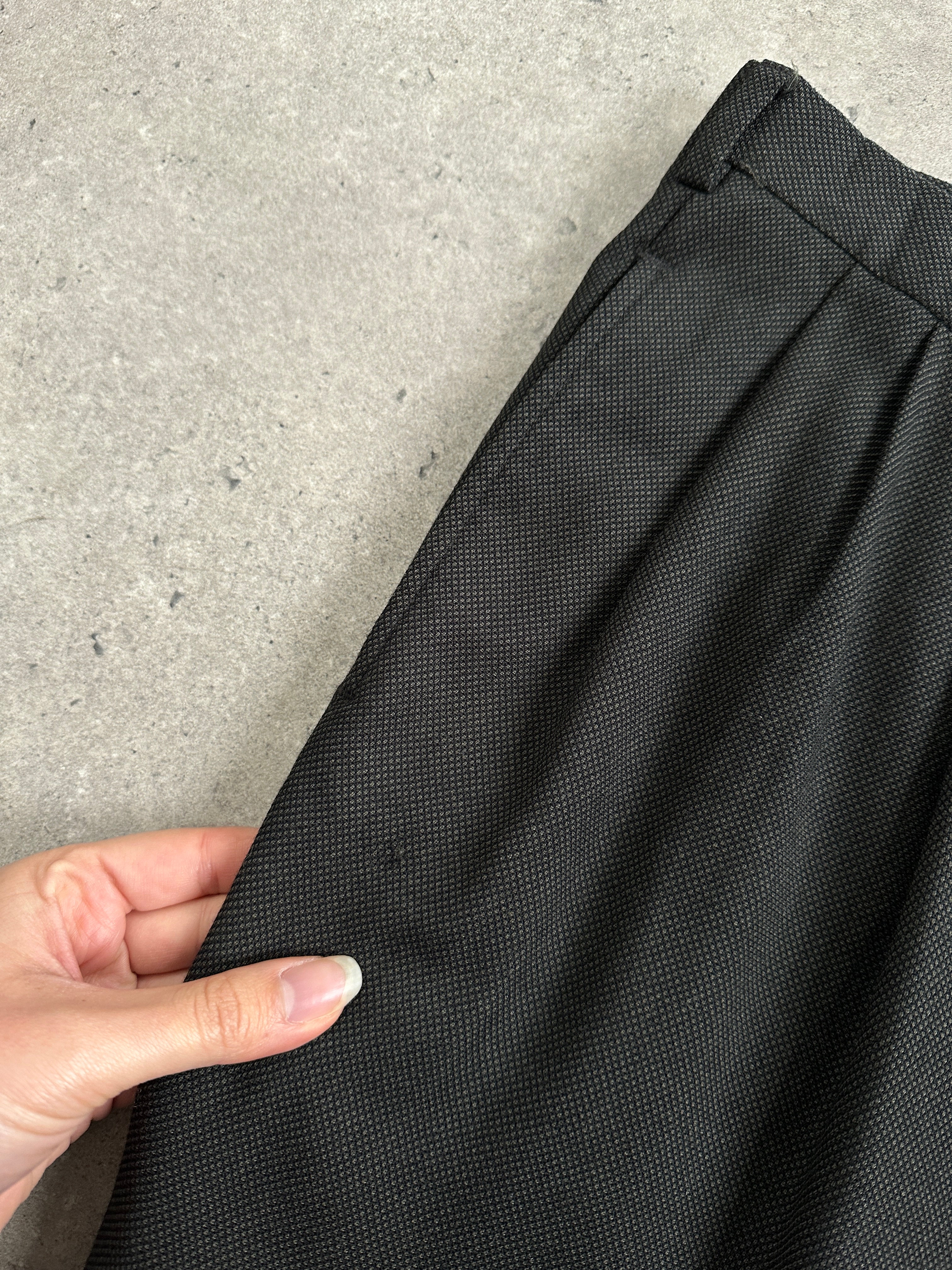 Christian Dior Monsieur wool straight-leg tailored trousers in W36, showing the classic fit and high-quality fabric.