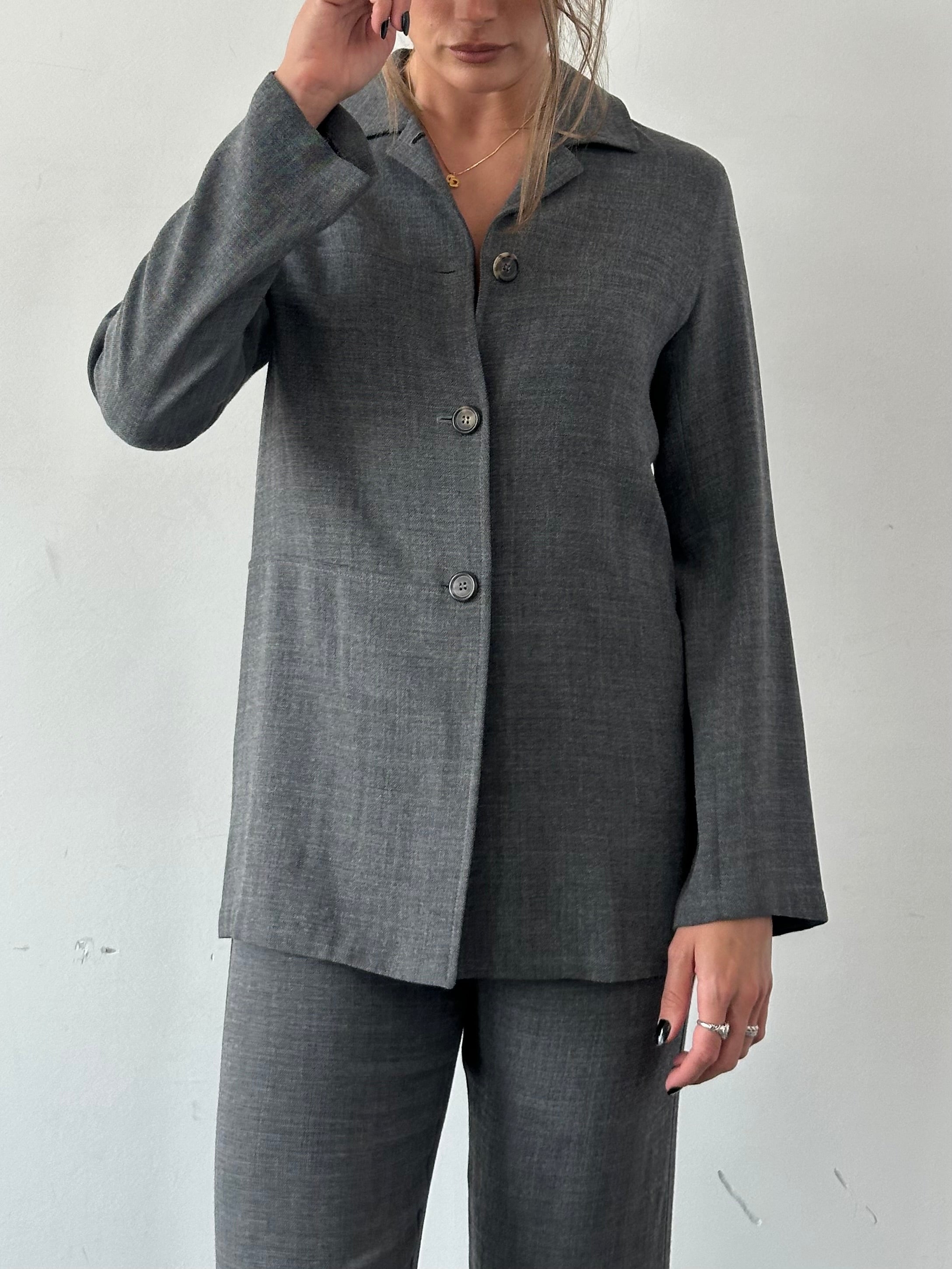 Marella wool two-piece trouser and jacket set, stylish tailored suit in neutral fabric, front view showing fitted design and classic cut.