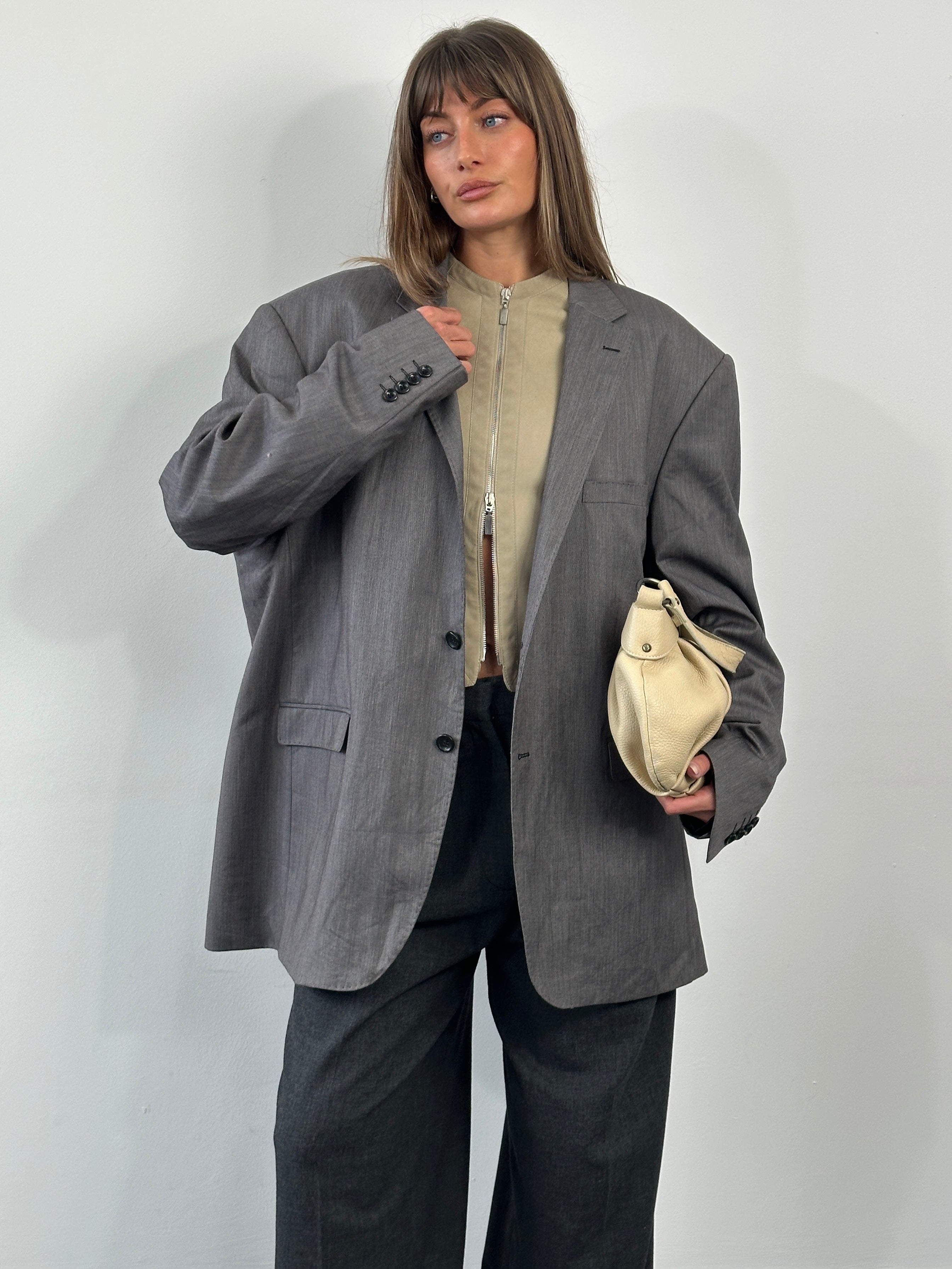 Loro Piana Doremen 1990s wool single-breasted blazer in size 50R/XXL, tailored fit with classic lapels and neutral color.
