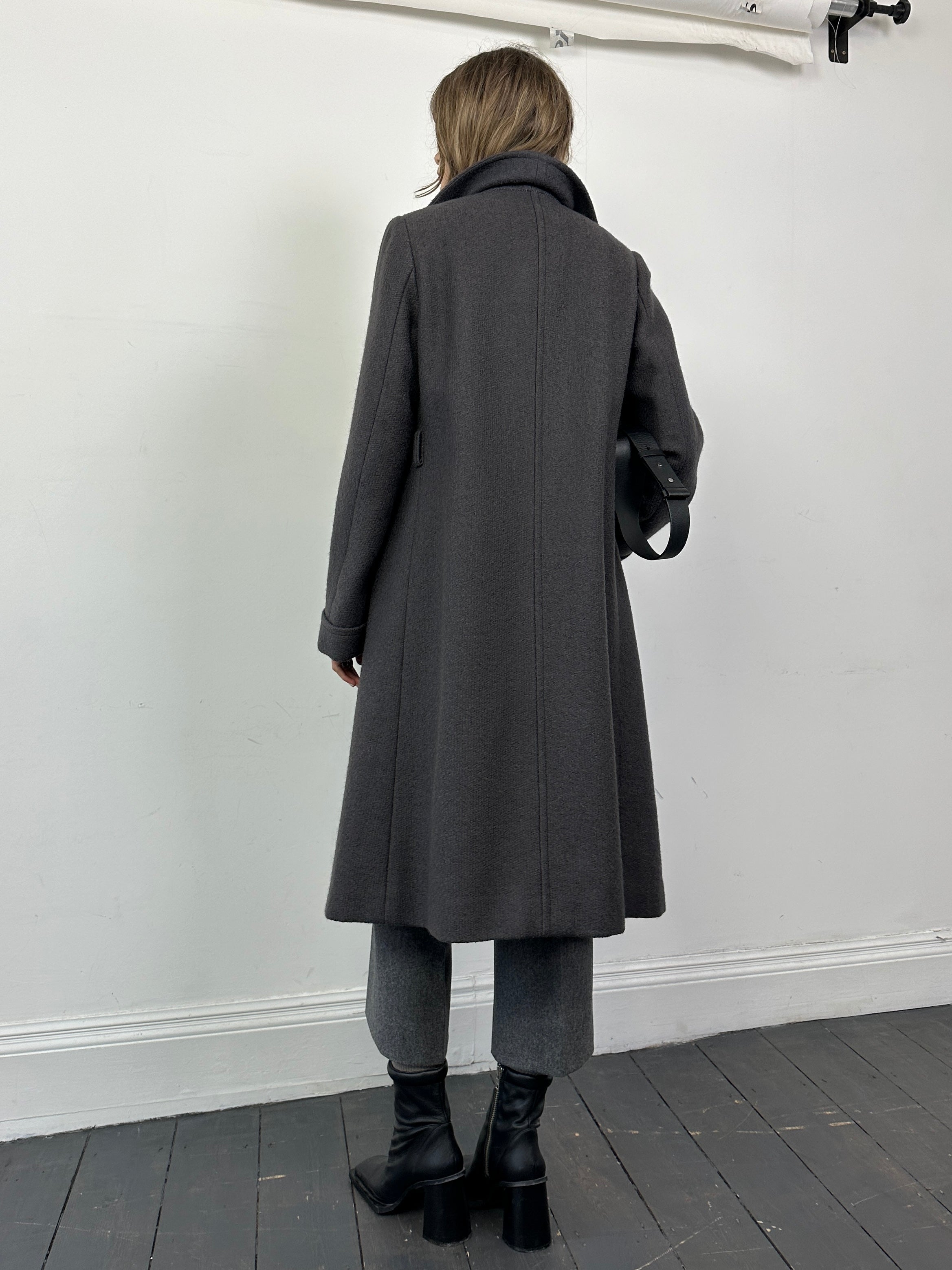 Vintage wool double-breasted A-line coat in size M/L, featuring classic design and tailored fit, ideal for stylish winter wear.