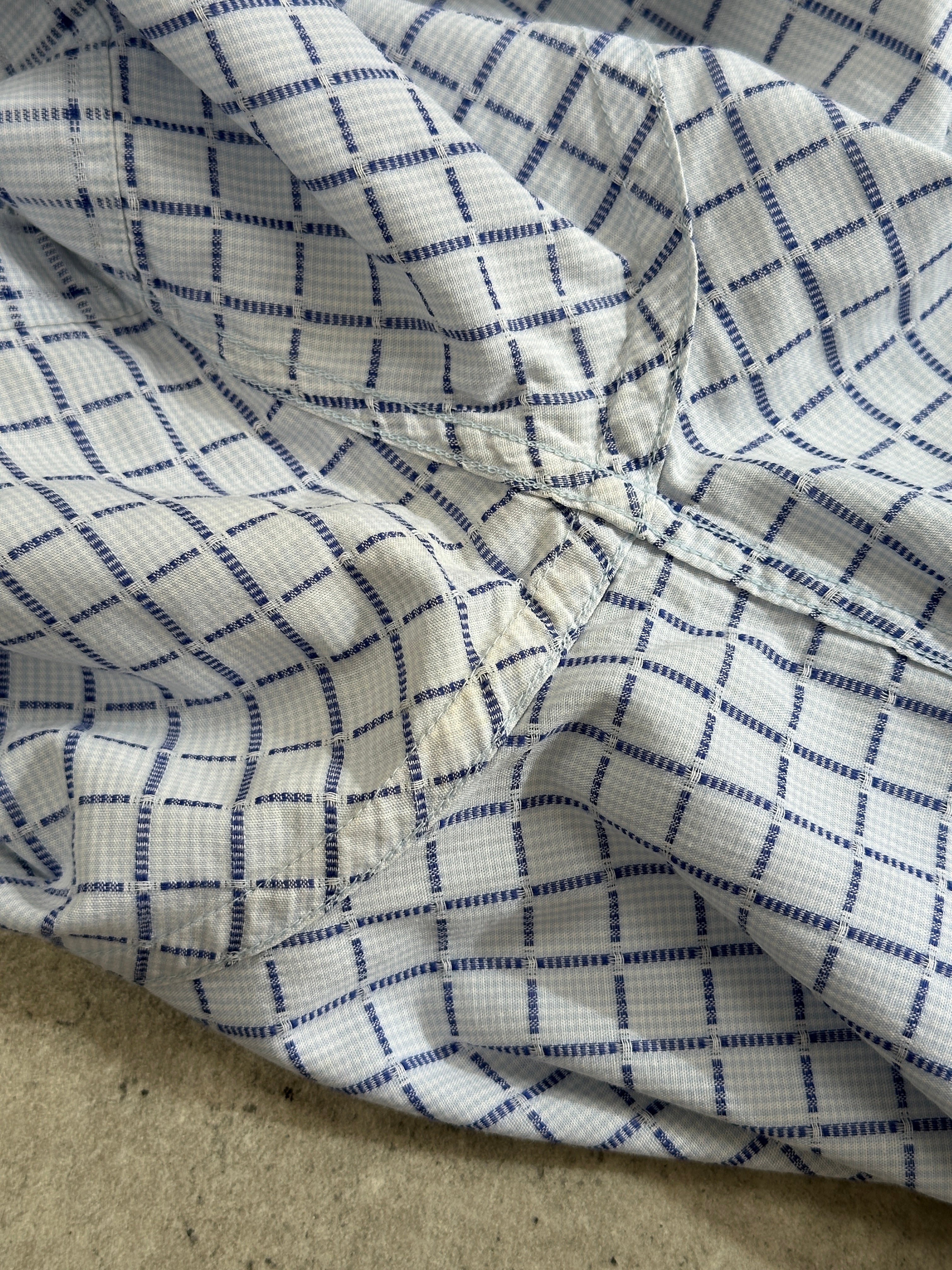 Yves Saint Laurent Pour Homme check short sleeve cotton shirt in size L, featuring a logo and classic pattern.
