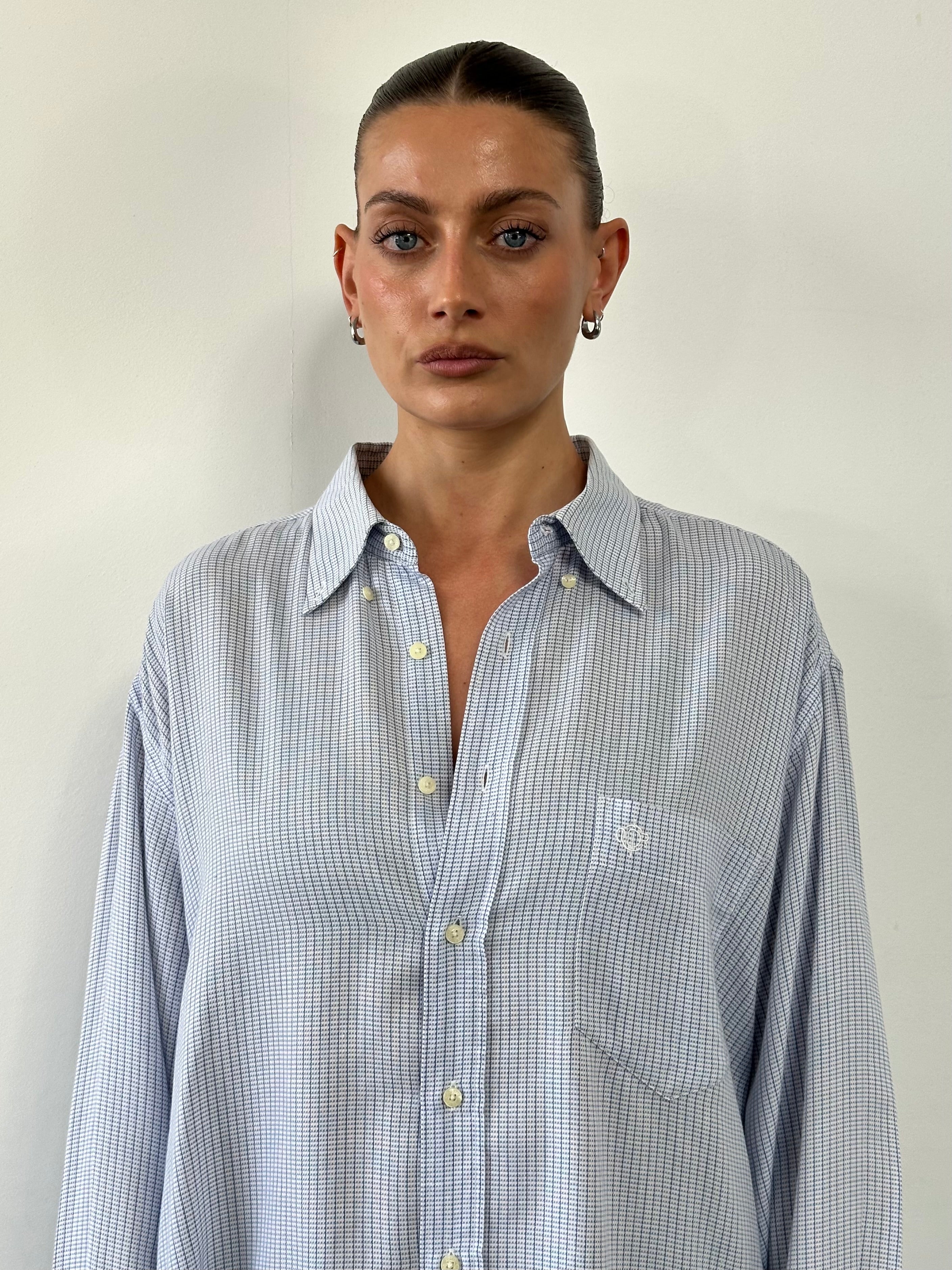 Christian Dior cotton check logo shirt in XL/XXL, featuring a classic pattern and brand logo on the front.