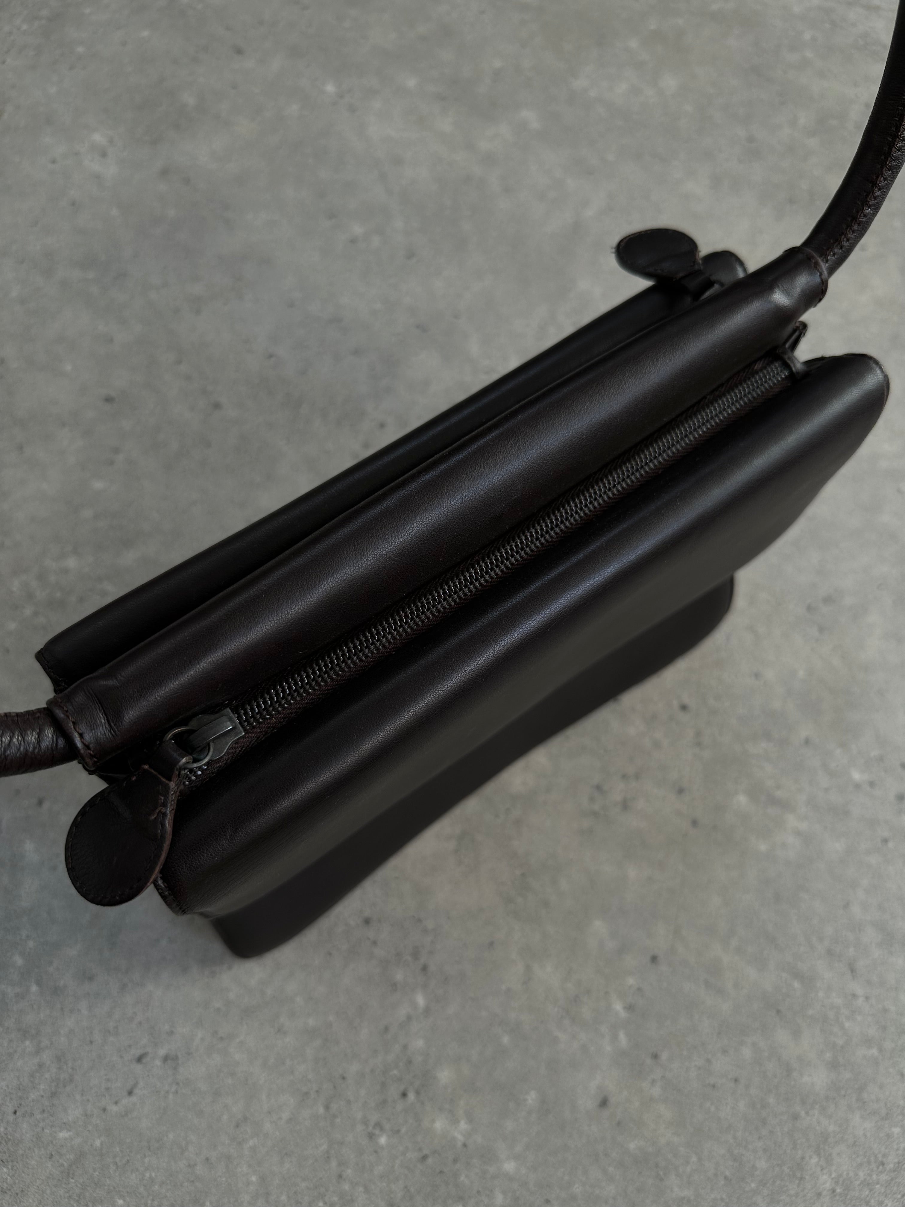 Giorgio Armani Le Collezioni leather shoulder bag with sleek design, featuring a smooth leather finish and subtle branding details.
