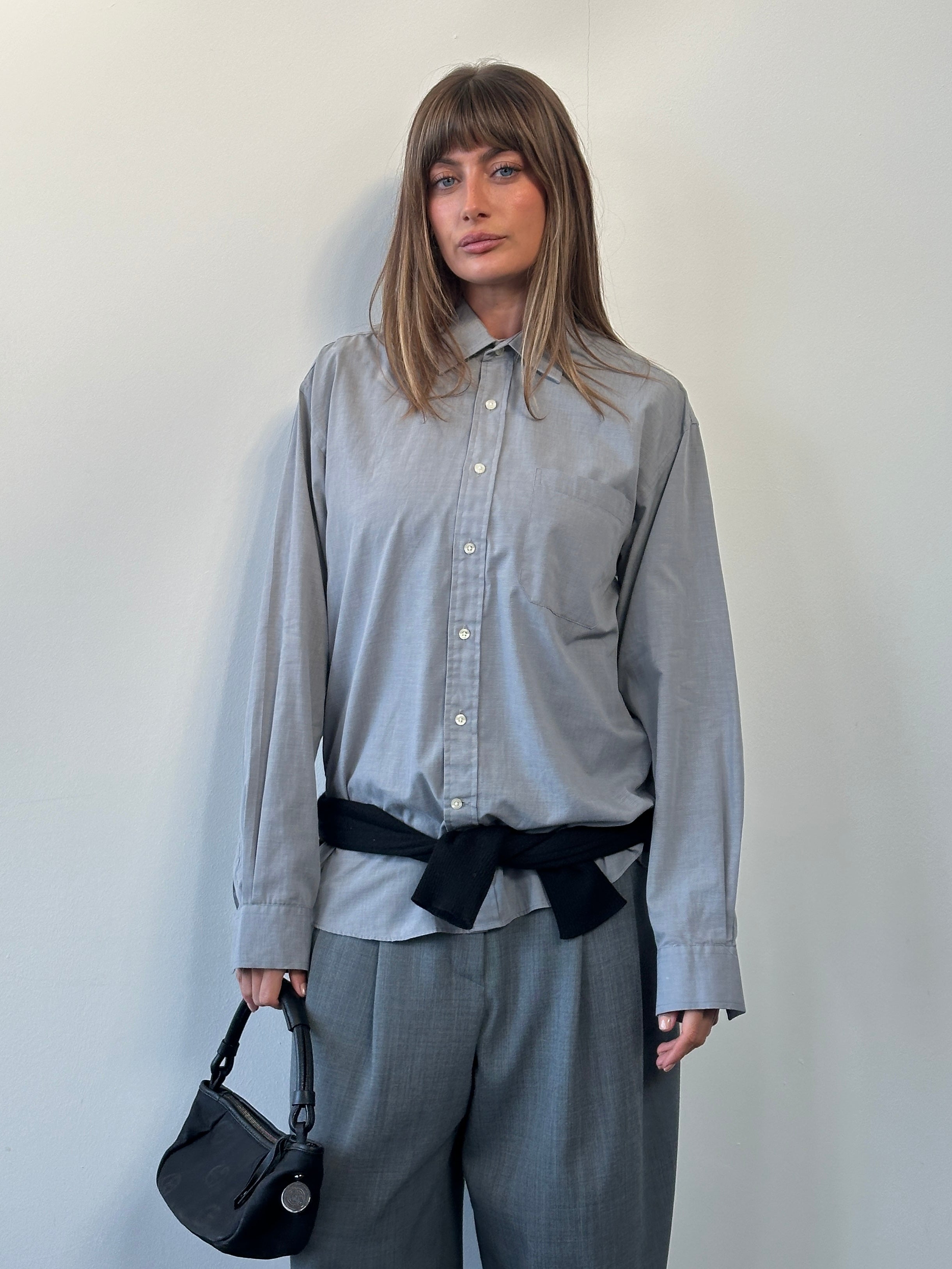 Christian Dior 1980s cotton shirt in size L/XL, featuring classic design and lightweight fabric, displayed on a hanger.