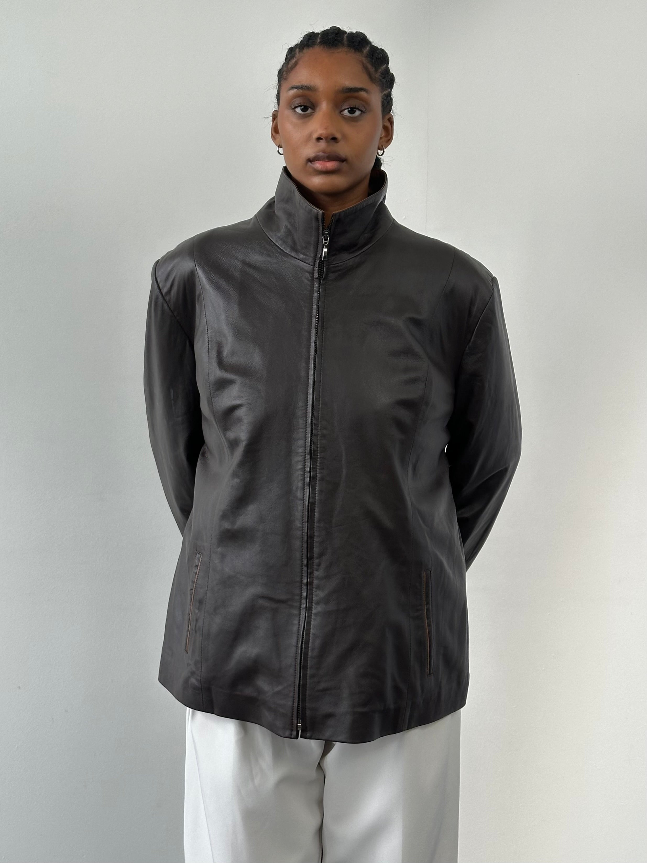 Vintage 1990s high neck contrast leather jacket in XL size, featuring classic design and textured black and brown leather details.