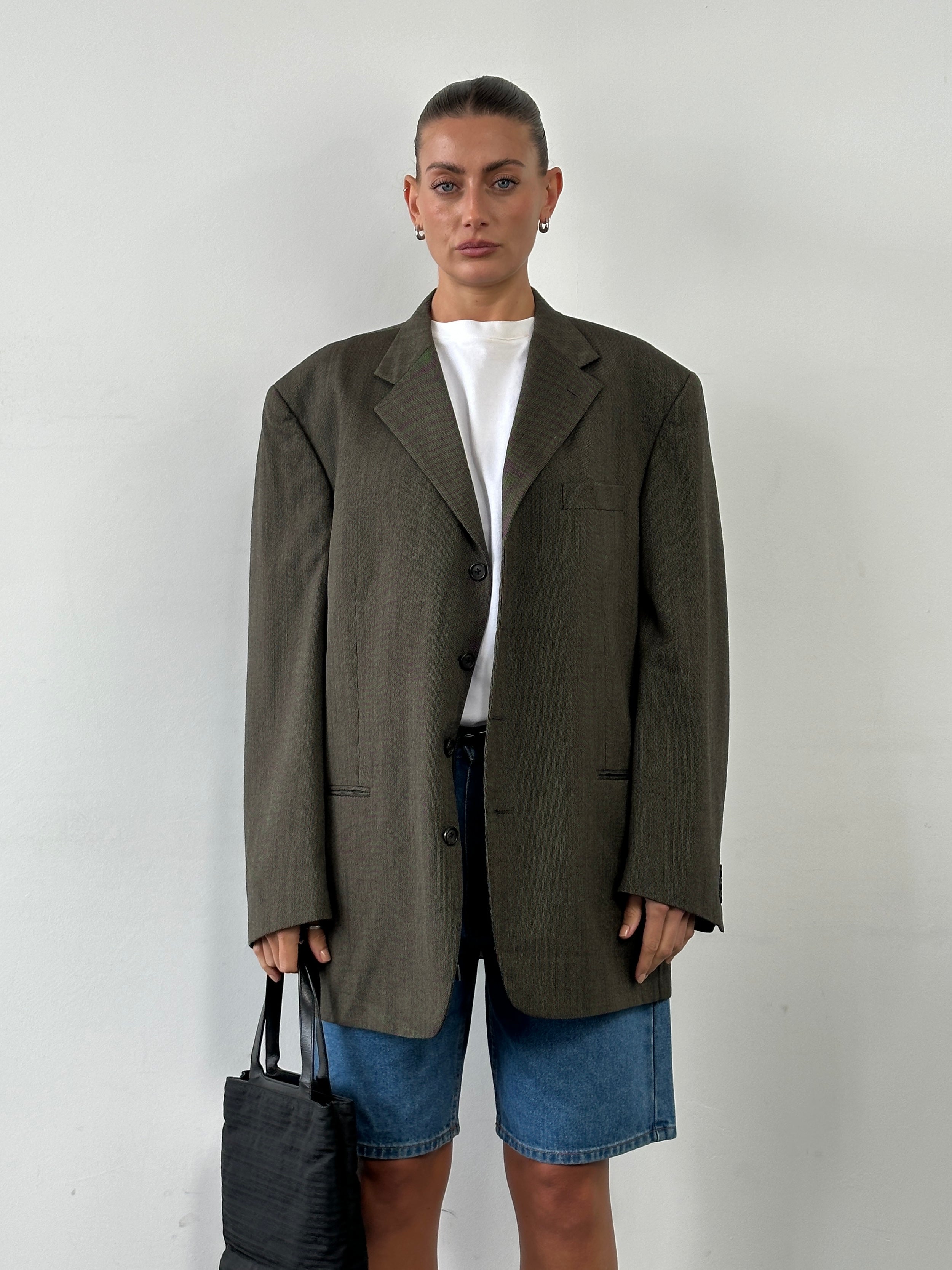 Givenchy Monsieur 90s pure wool single-breasted blazer in size 46R/XXL, shown on a hanger with a classic tailored fit.
