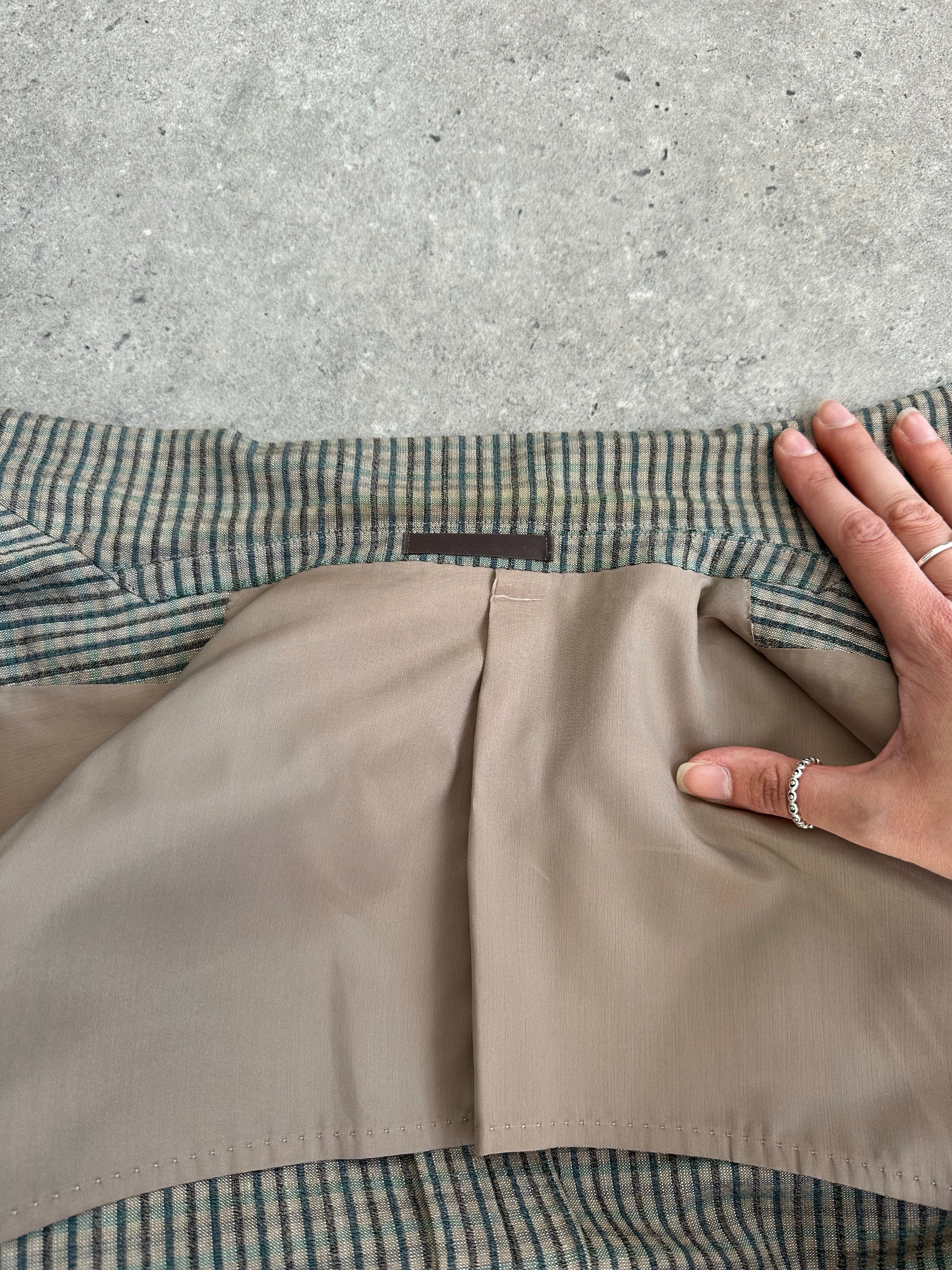 Burberry 1990s wool silk check blazer in size S, unlined, featuring classic plaid pattern and tailored fit.