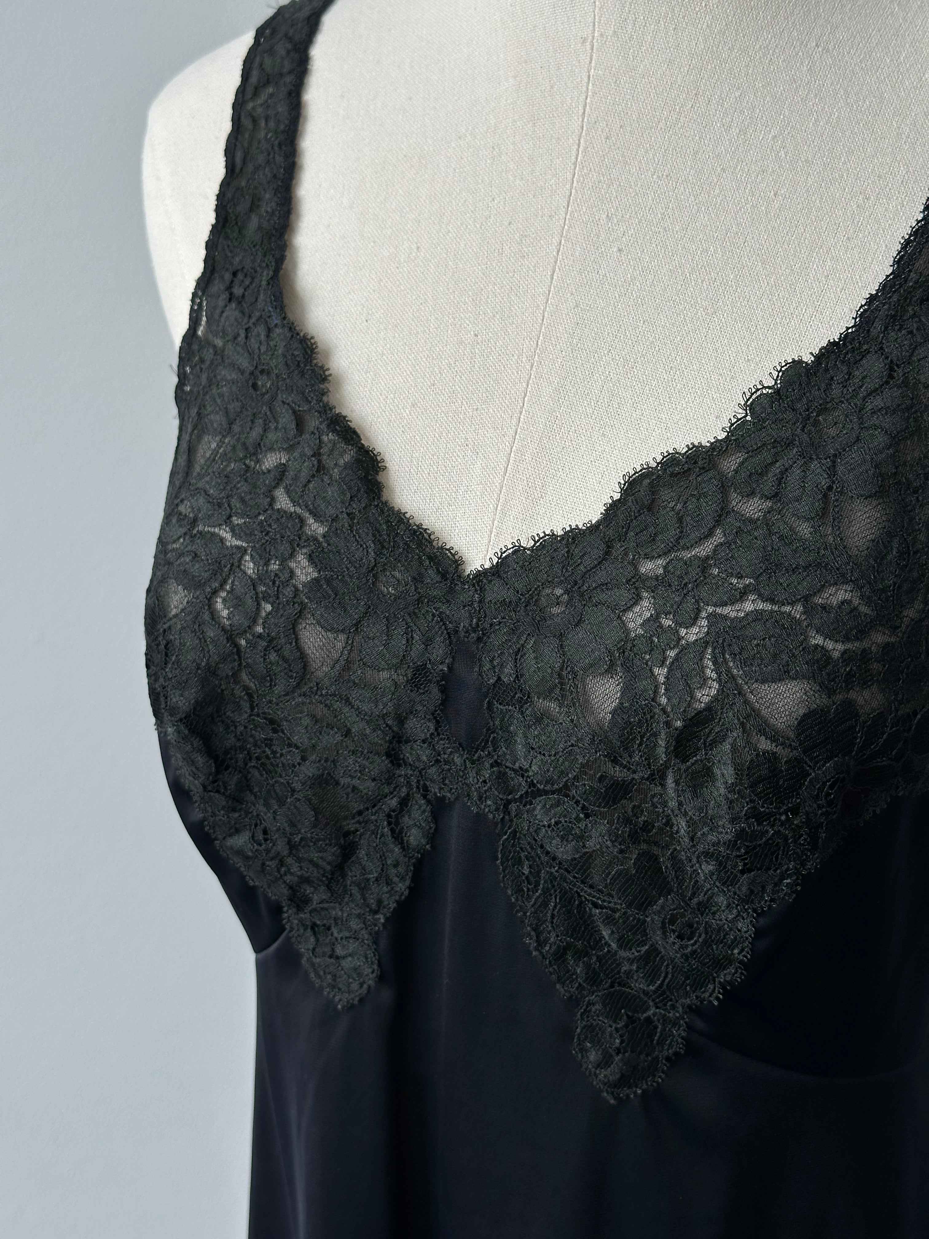 Italian Vintage 1990s lace mini dress in size small, with intricate lace details and a classic 90s silhouette.
