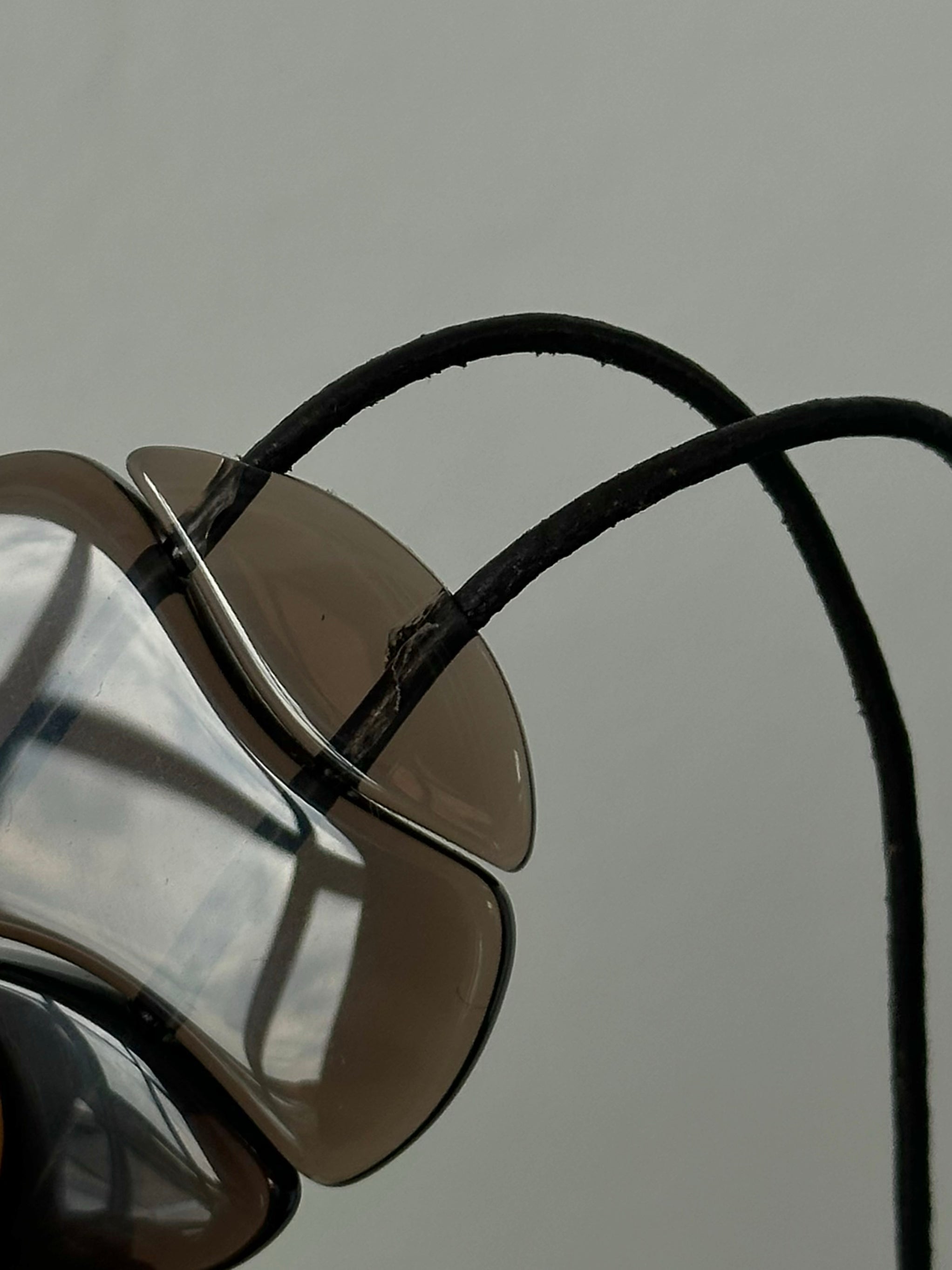 Emporio Armani 2000s glass pendant leather necklace featuring a sleek leather strap and a stylish glass pendant for jewelry style.