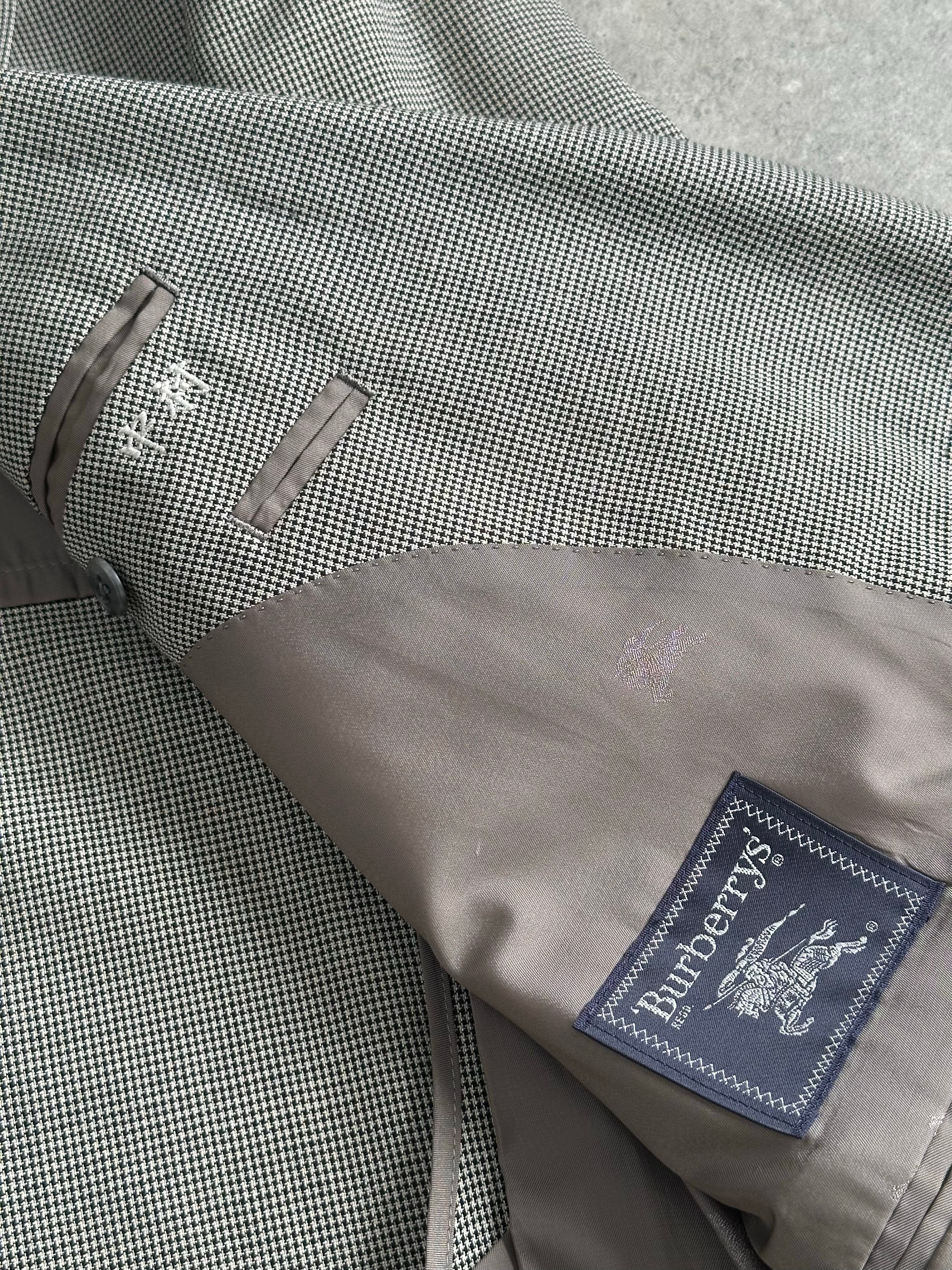 Burberry 1990s bespoke button wool double-breasted blazer in size L, tailored with classic check lining and structured fit.