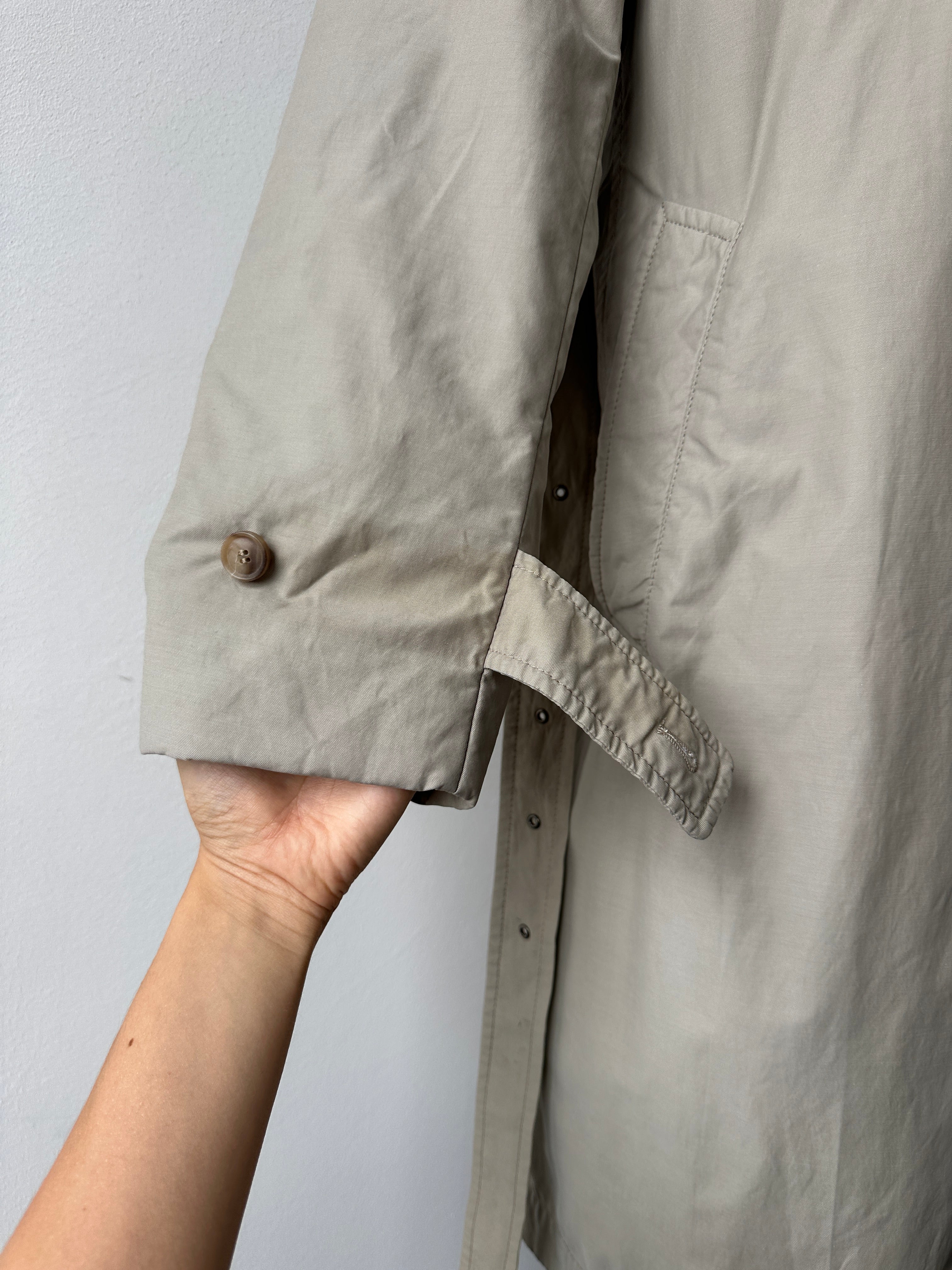 Hugo Boss 2000s high neck belted trench coat in size L, beige with waist belt and classic trench design displayed on a model.