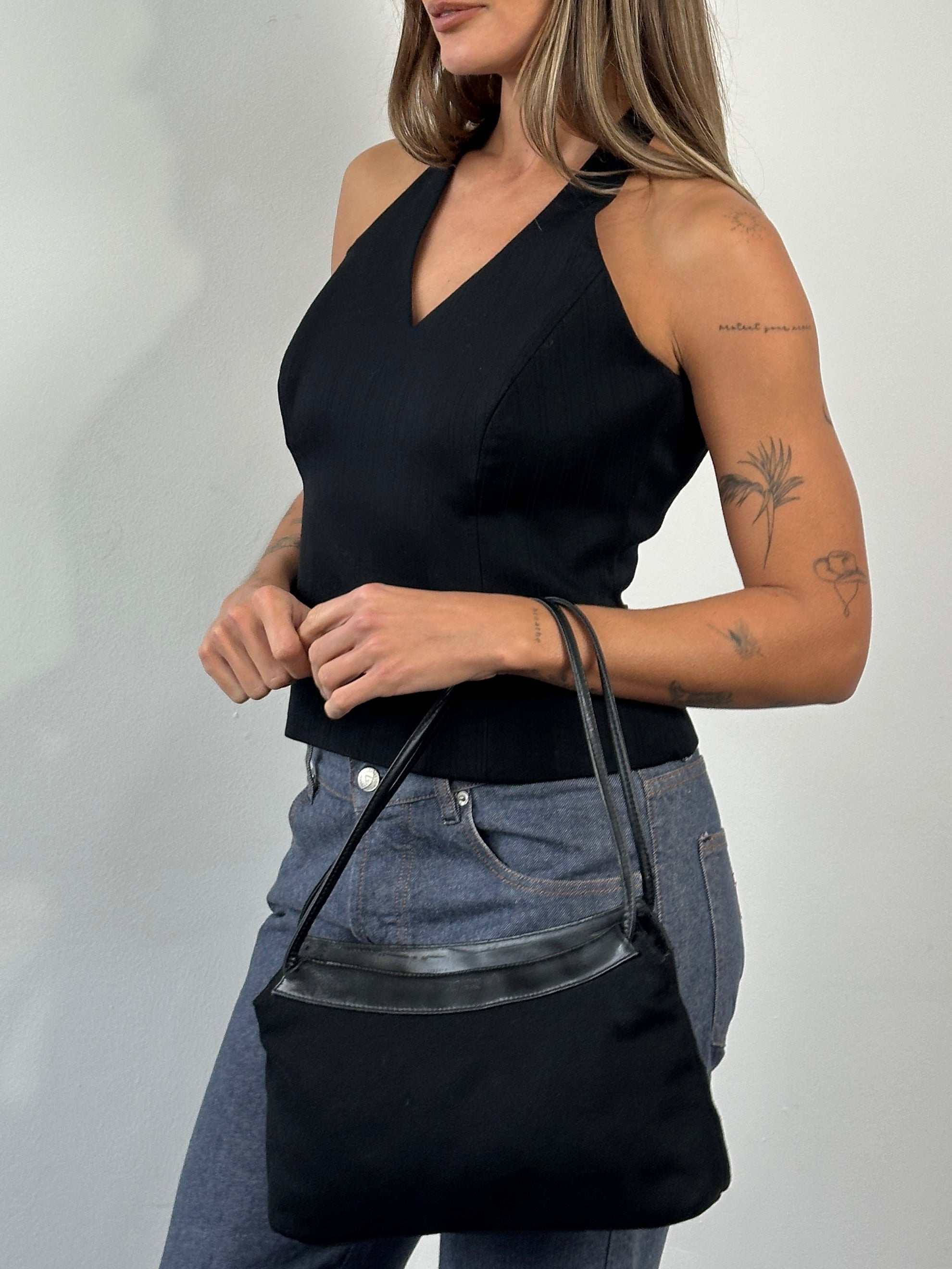 Vintage 2000s structured halterneck tank top in size L, featuring a fitted design and classic style from the Vintage brand.