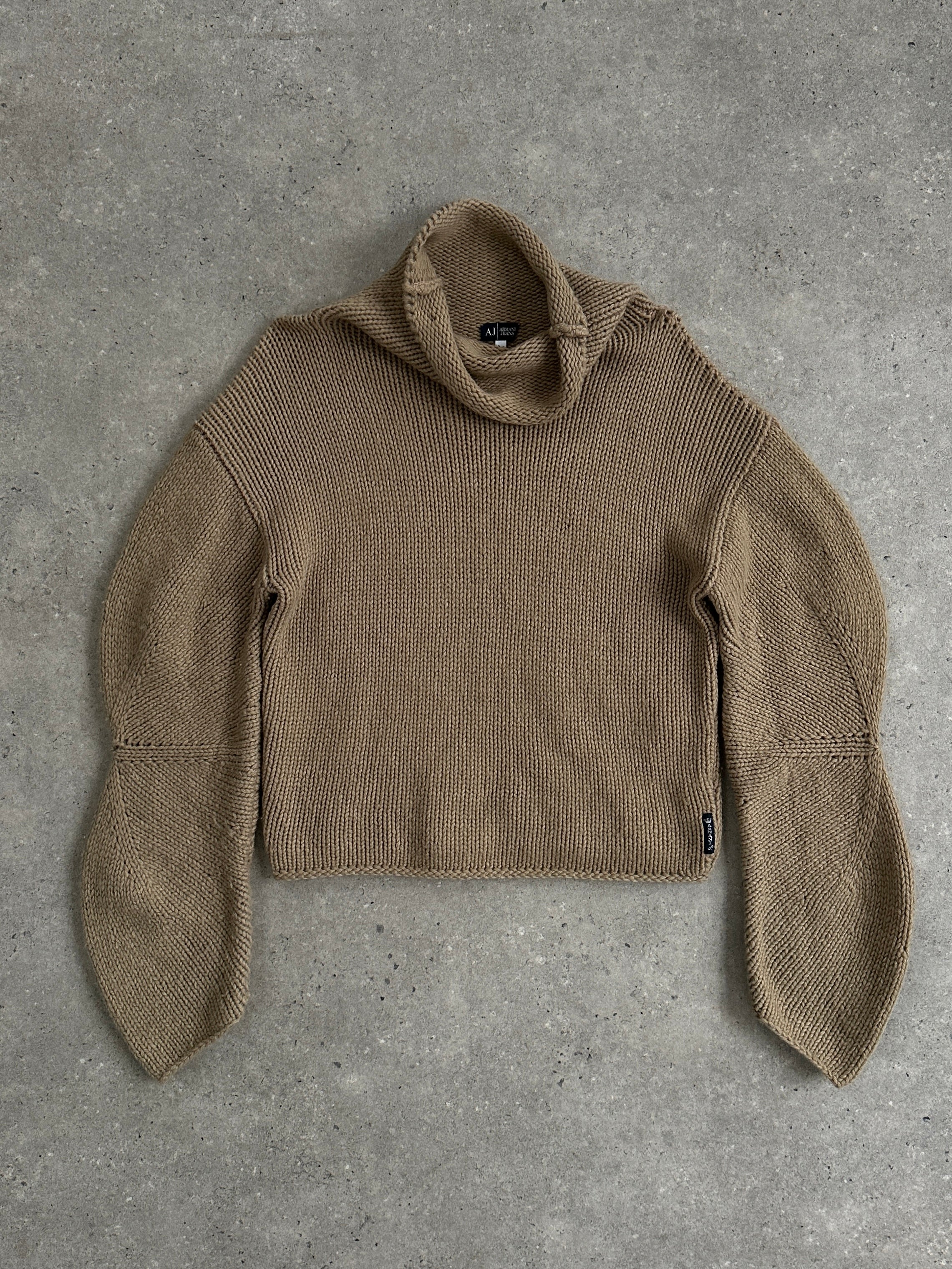 Armani jeans wool roll neck jumper in size M, featuring a cozy knit design and classic fit, displayed on a neutral background.