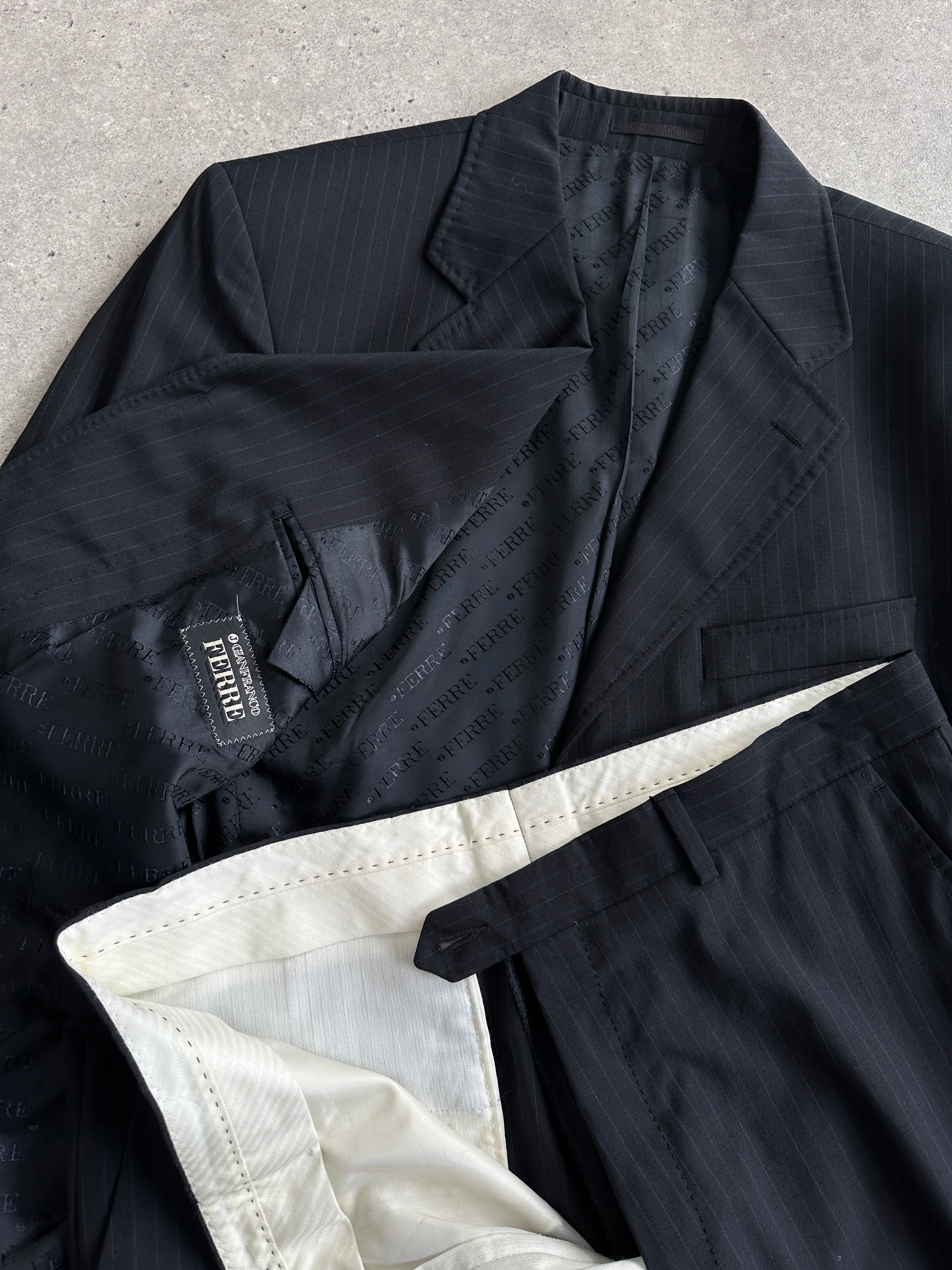 Gianfranco Ferre pinstripe pure wool single-breasted jumpsuit in size 42R/W36, featuring a tailored fit and classic pinstripe pattern.