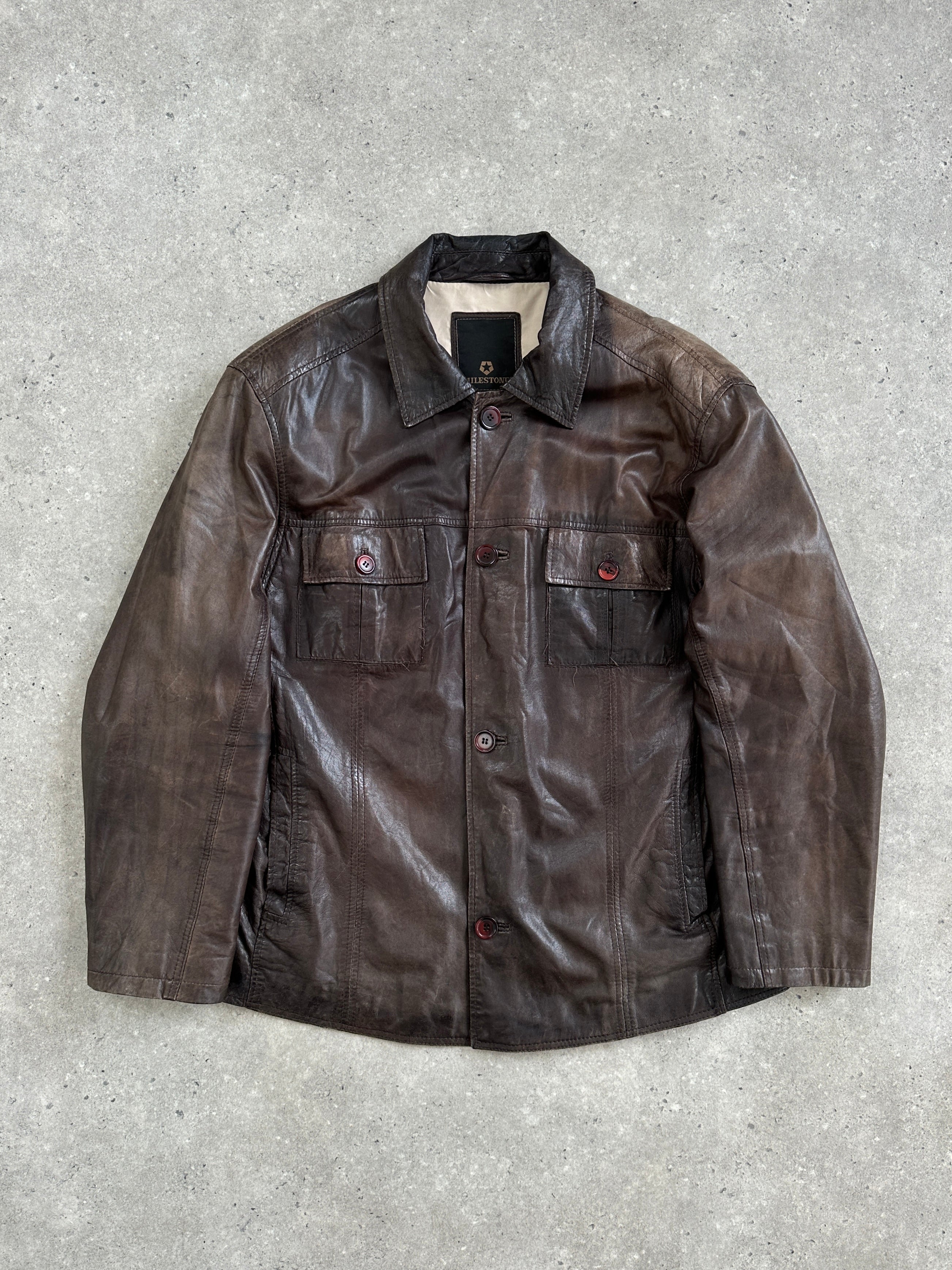 Vintage 1990s XL aged leather jacket showing distressed brown leather with classic collar and zipper front detail.