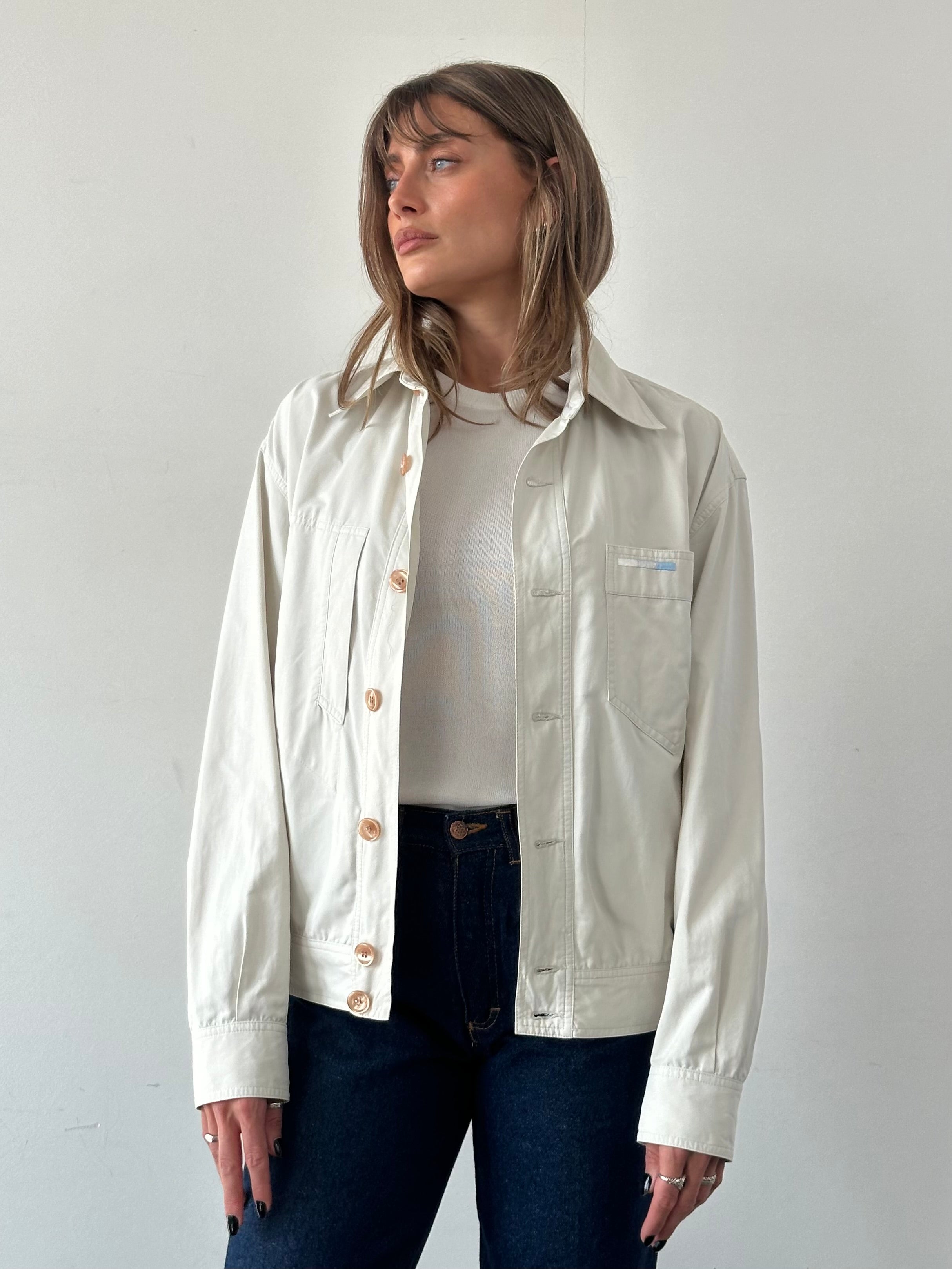 Iceberg button-up bomber jacket in black, featuring a classic fit and stylish design, displayed on a hanger.