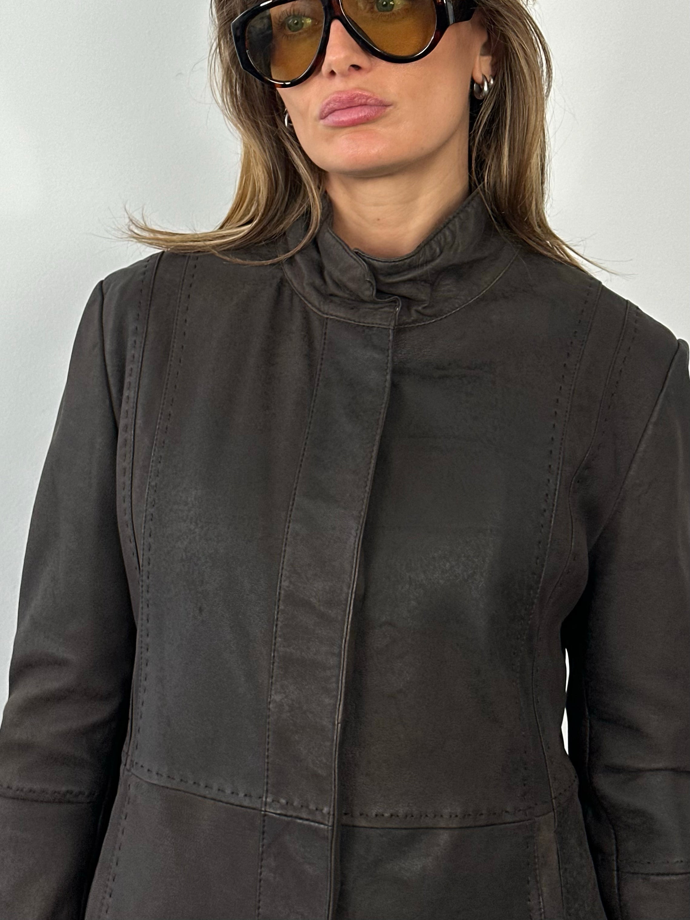Vintage 1990s high neck leather jacket in black leather, size small, with classic design and detailed stitching.