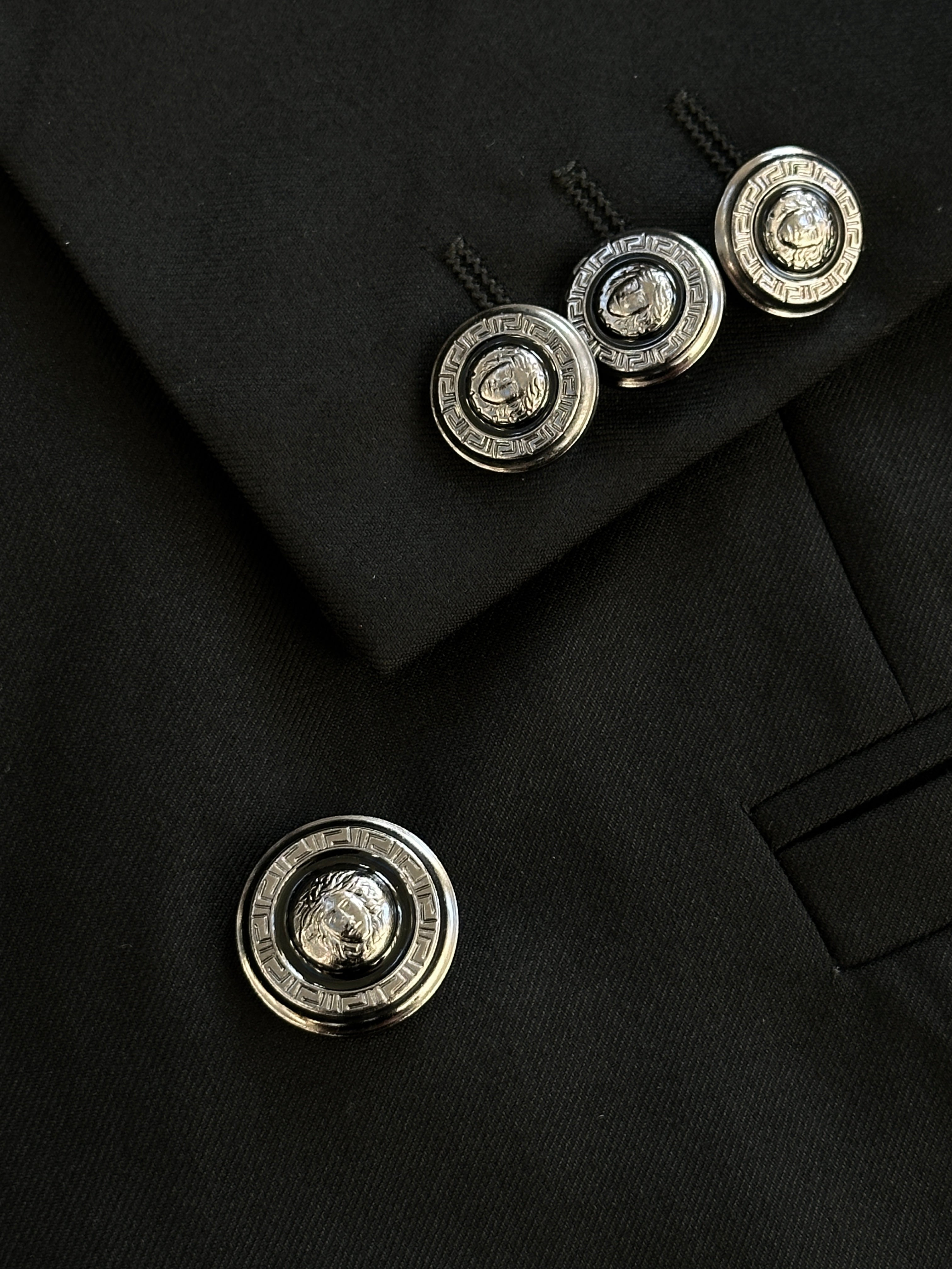 Versace 1990s bespoke Medusa button double-breasted blazer in size 40R/L, tailored with luxurious fabric and iconic Medusa details.