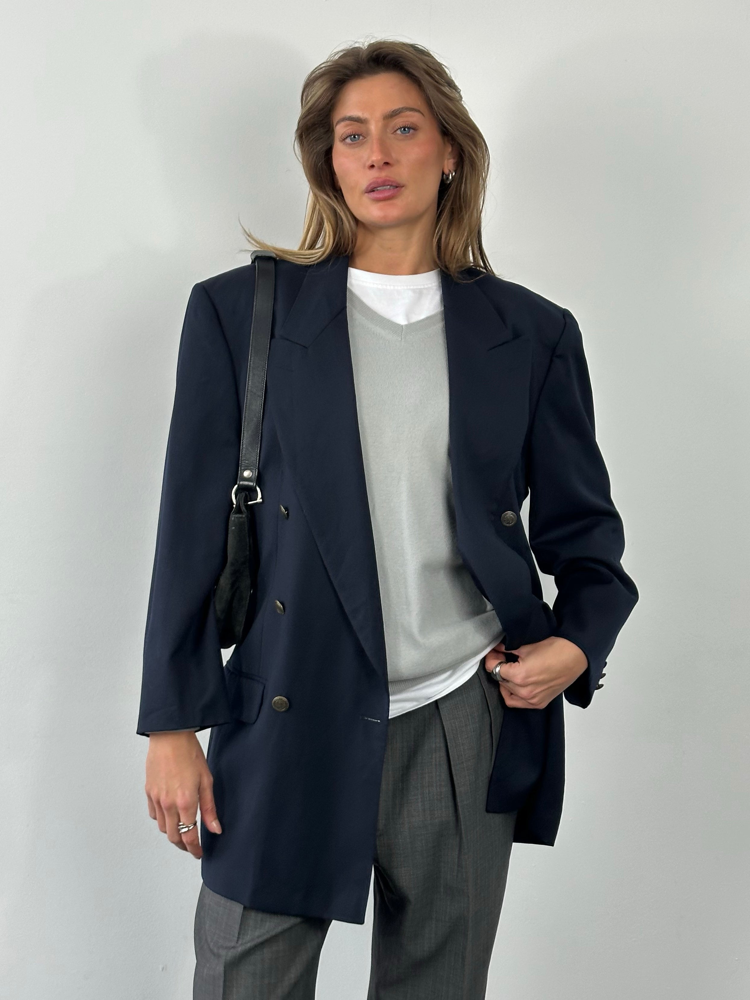Yves Saint Laurent 1980s bespoke double-breasted wool blazer in XL/XXL, classic tailored design, in a rich dark color.