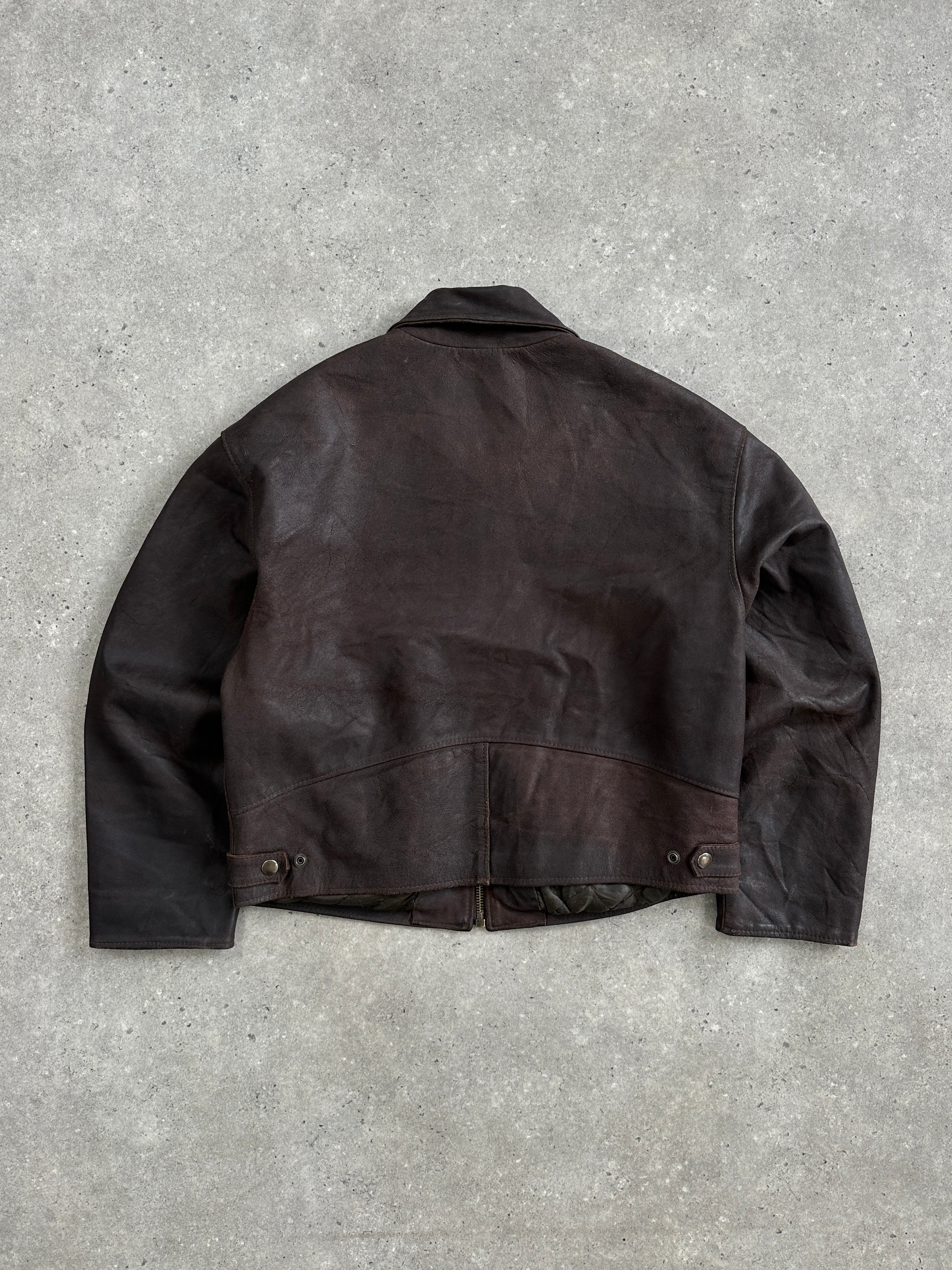 Vintage 1980s leather cropped jacket, size large, featuring classic design and distressed leather detail.