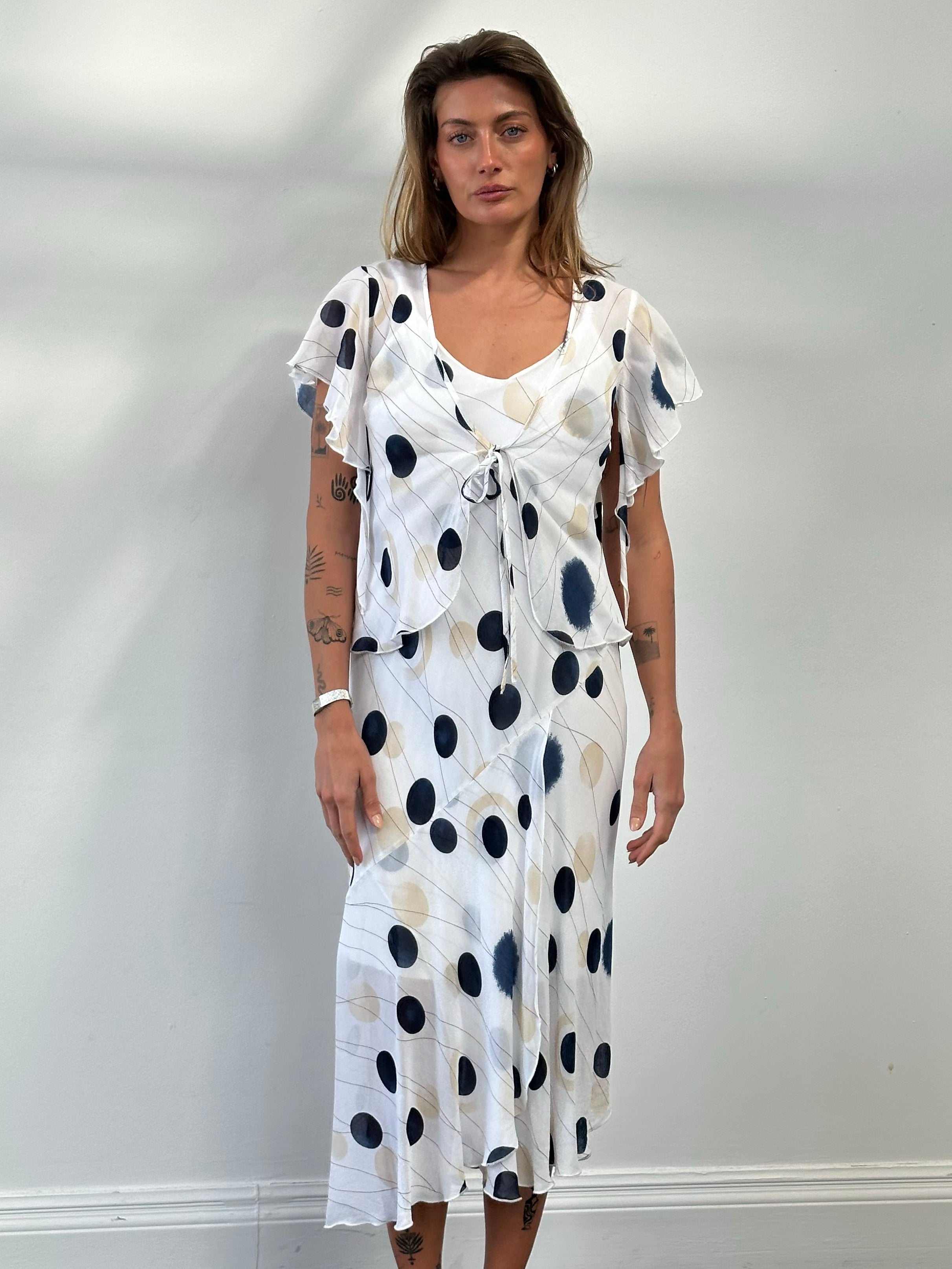 MANI 1990s spotted two-piece slip dress set with a sleeveless top and matching skirt, featuring a stylish vintage-inspired design.