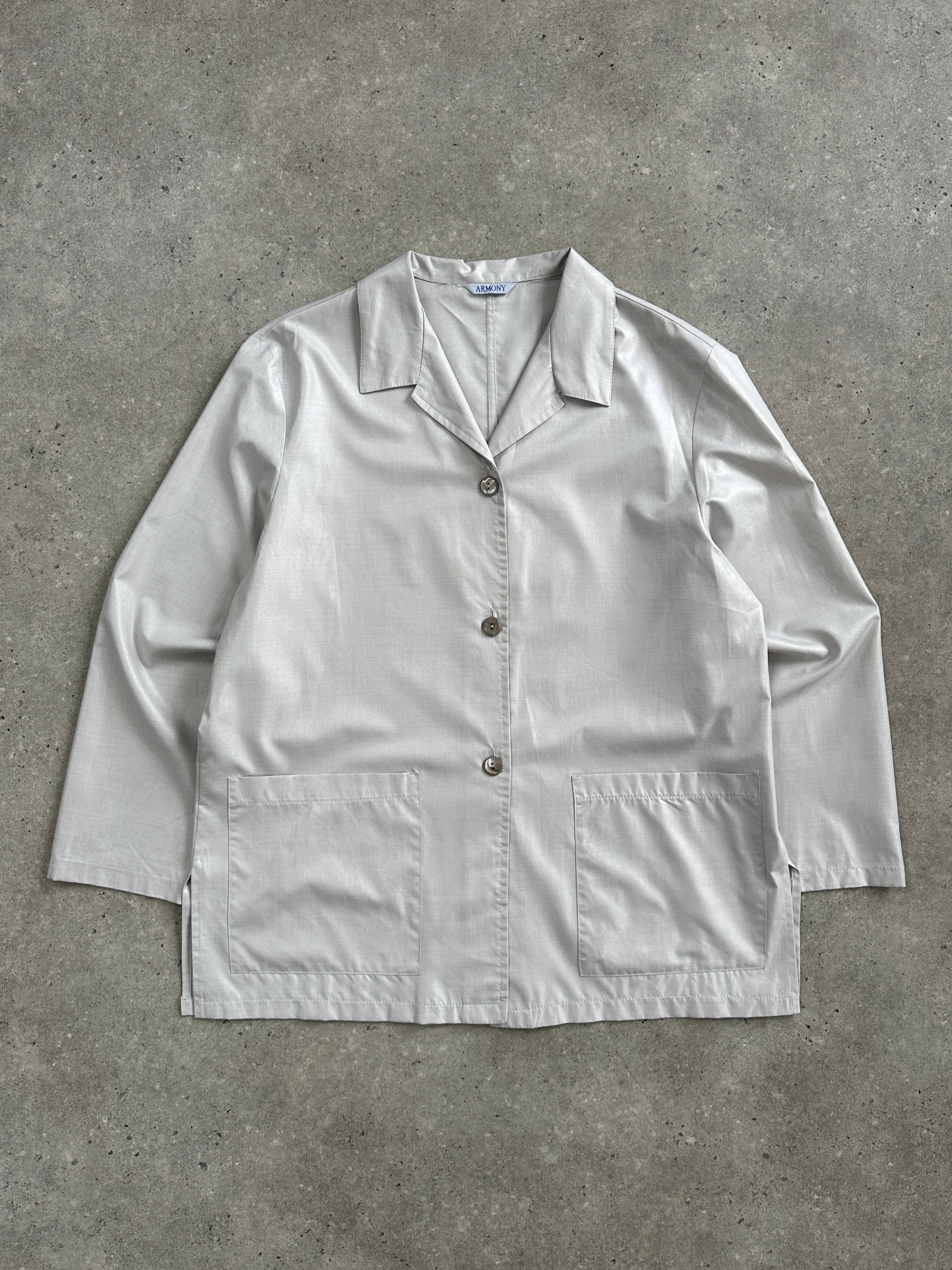 Vintage Italian 1990s lightweight unlined jacket, size large, with casual fit and classic design, shown on a hanger.