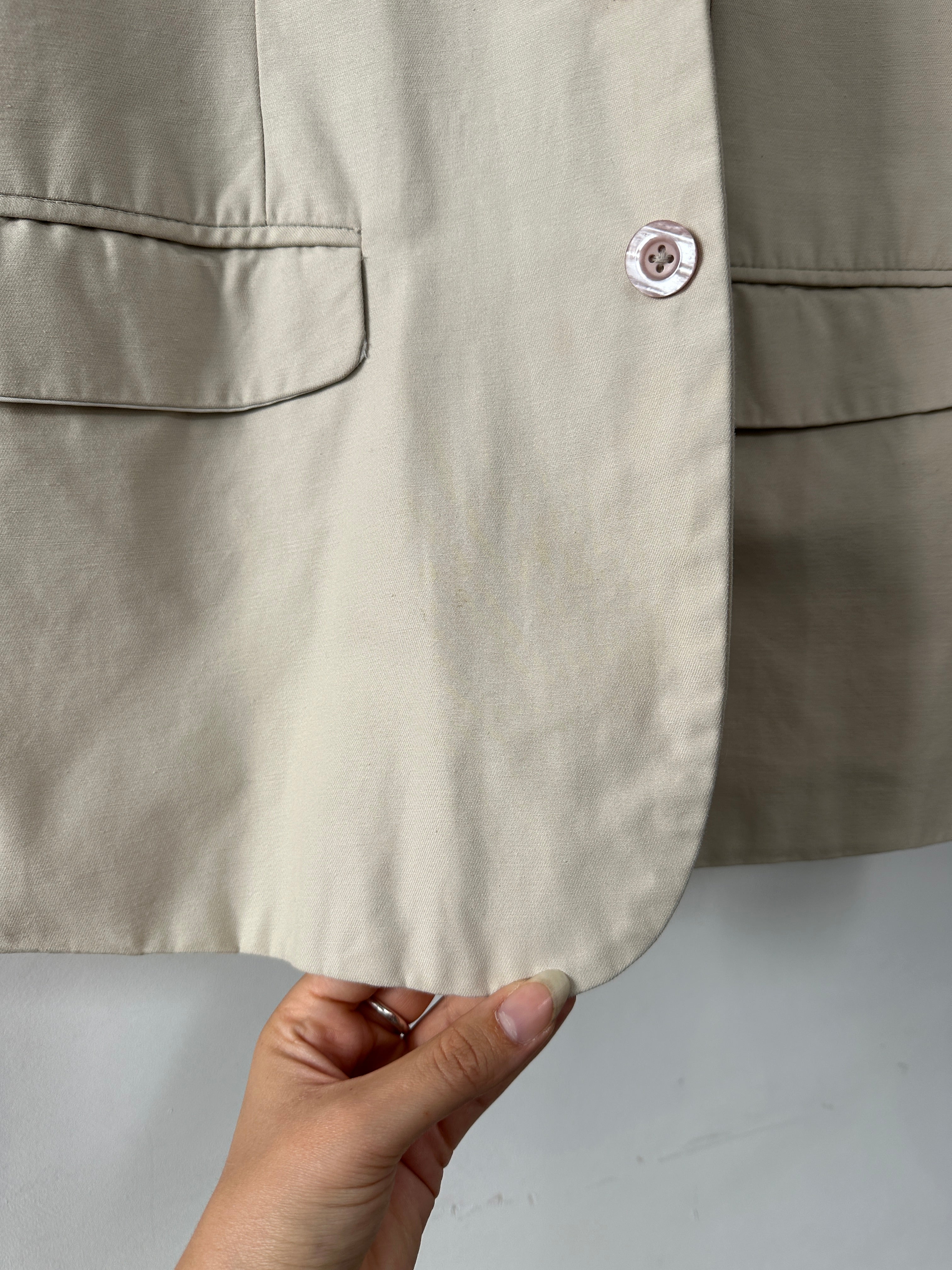 Vintage cotton single-breasted blazer in size L, featuring classic tailored fit and button front, displayed on a hanger.