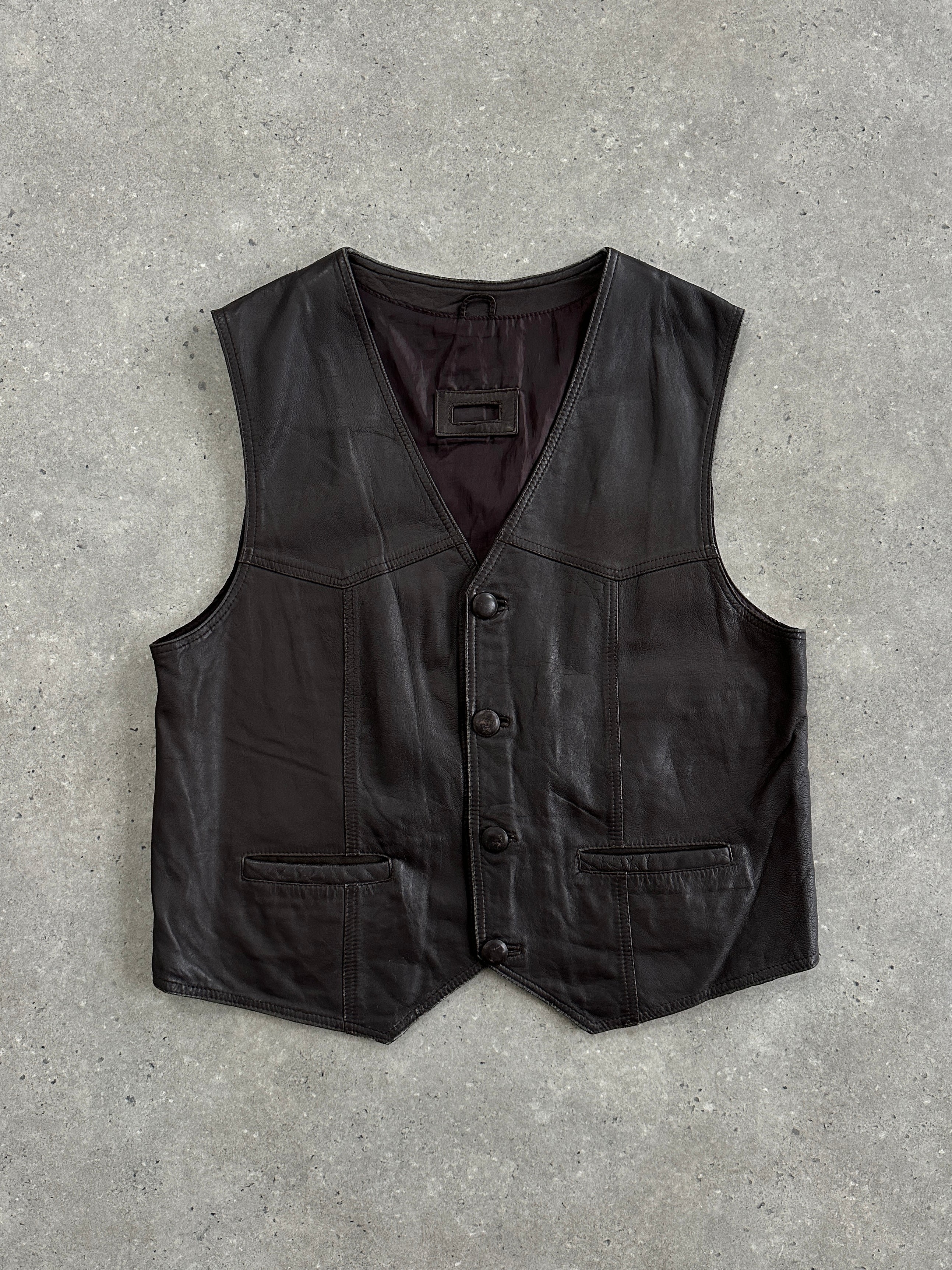 Vintage 1990s leather waistcoat in XL size, classic retro style, featuring durable leather construction and a timeless design.
