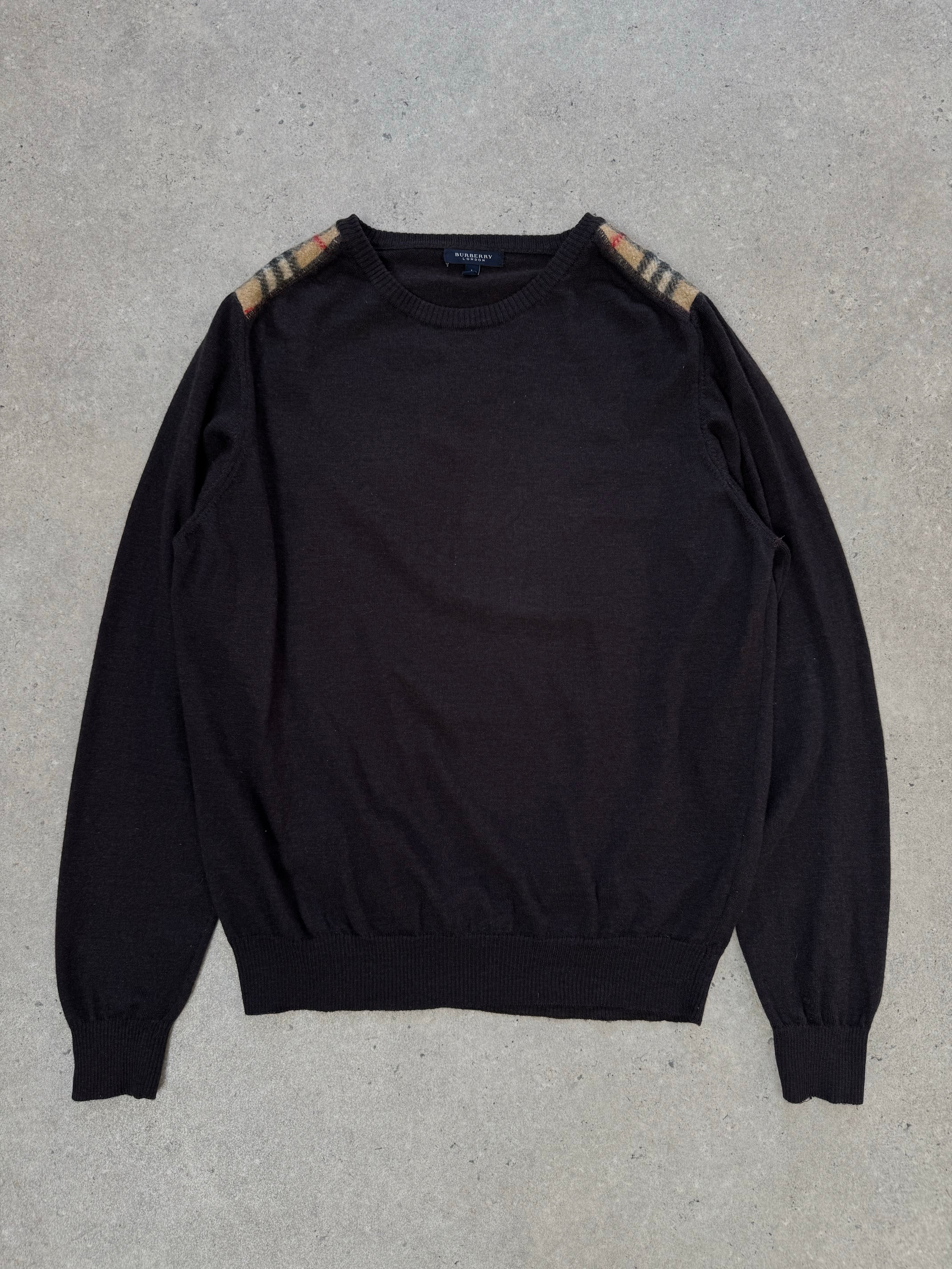 Burberry London 2000s wool knit jumper in size M, featuring classic check pattern and cozy, textured wool fabric.