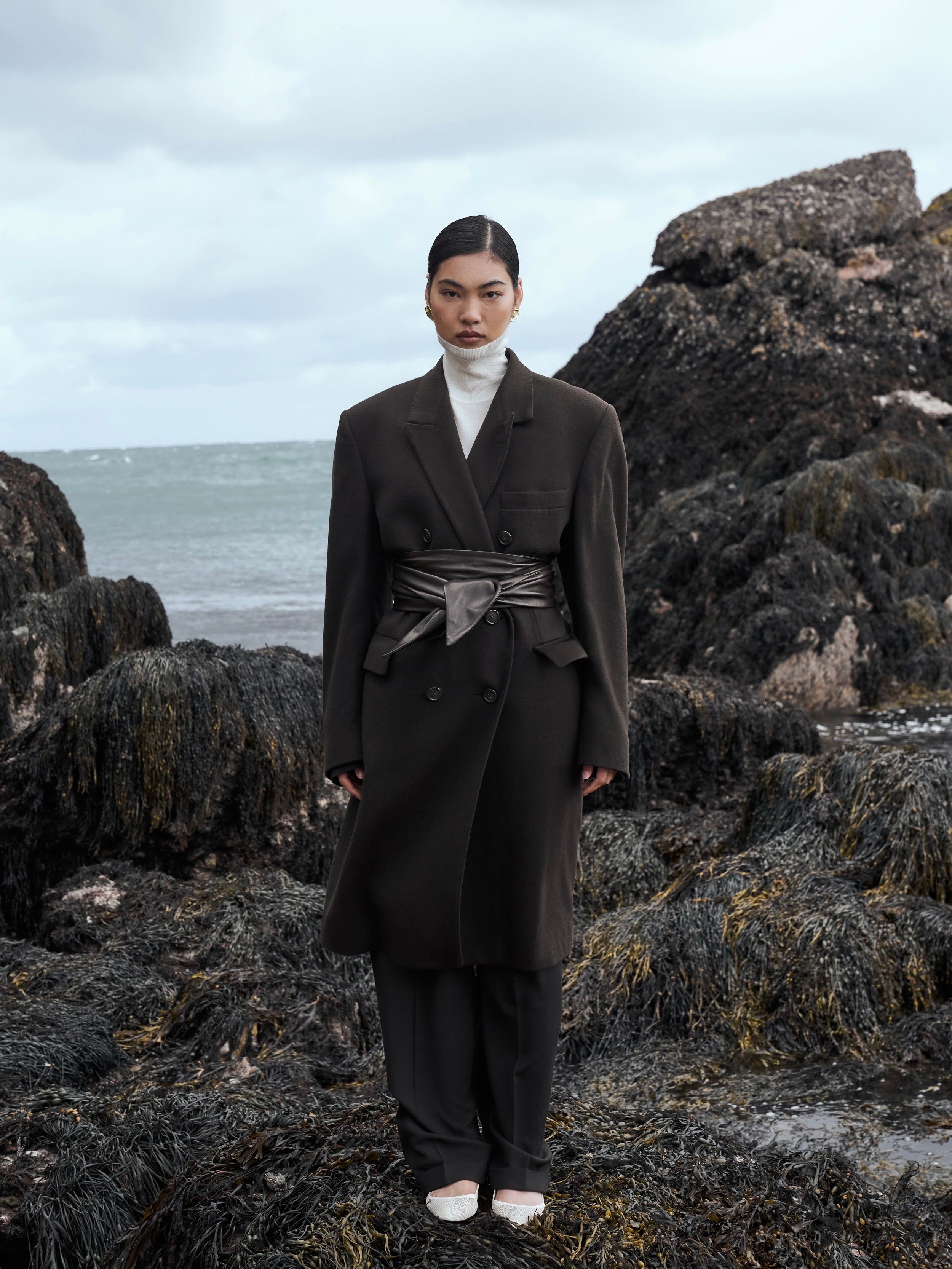 Christian Dior wool cashmere double-breasted coat in XL, showcasing a tailored design with classic lapels and button details.