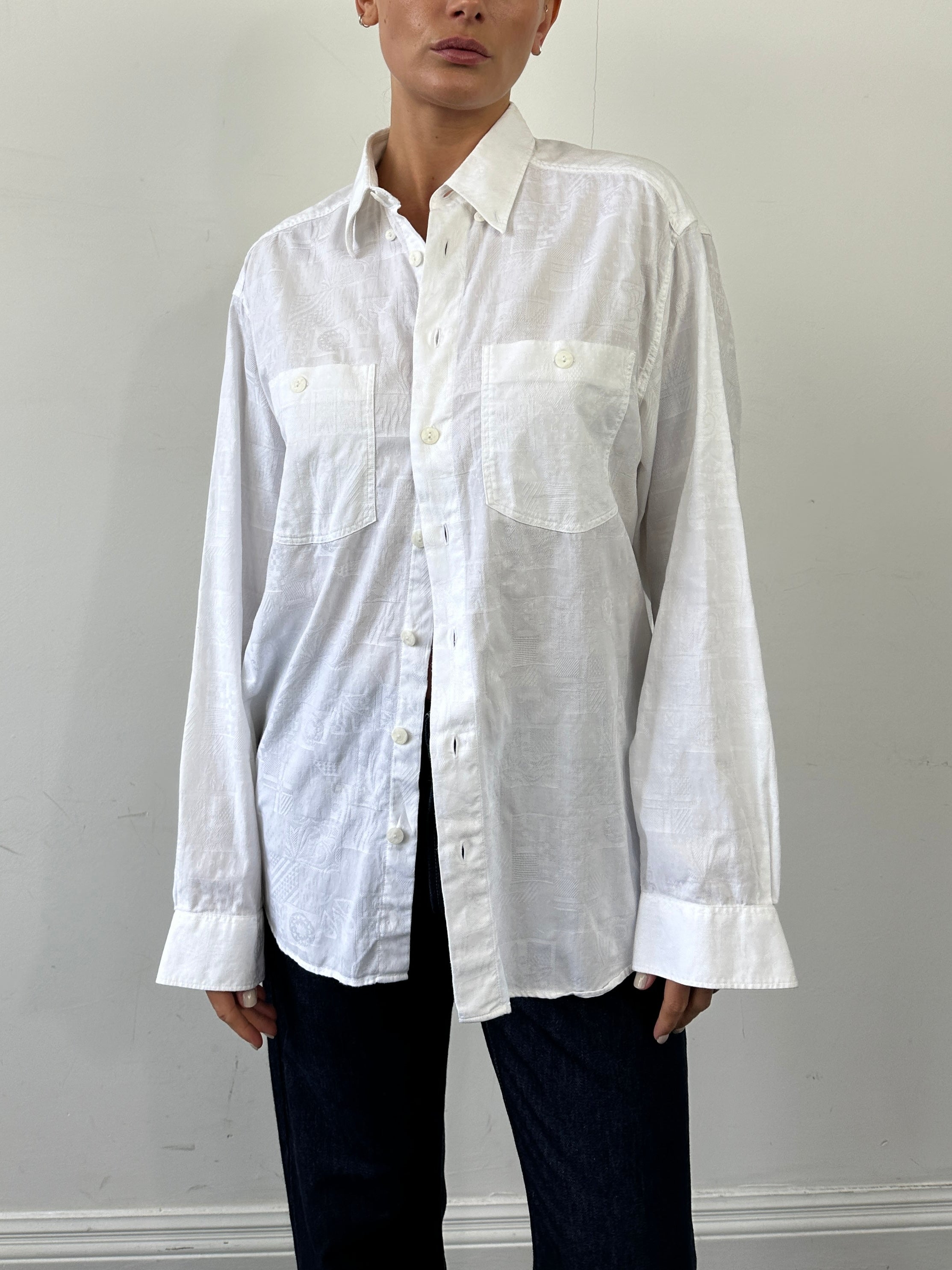 Vintage embroidery cotton shirt in XL with colorful floral patterns, classic long-sleeve design, and vintage-inspired style.