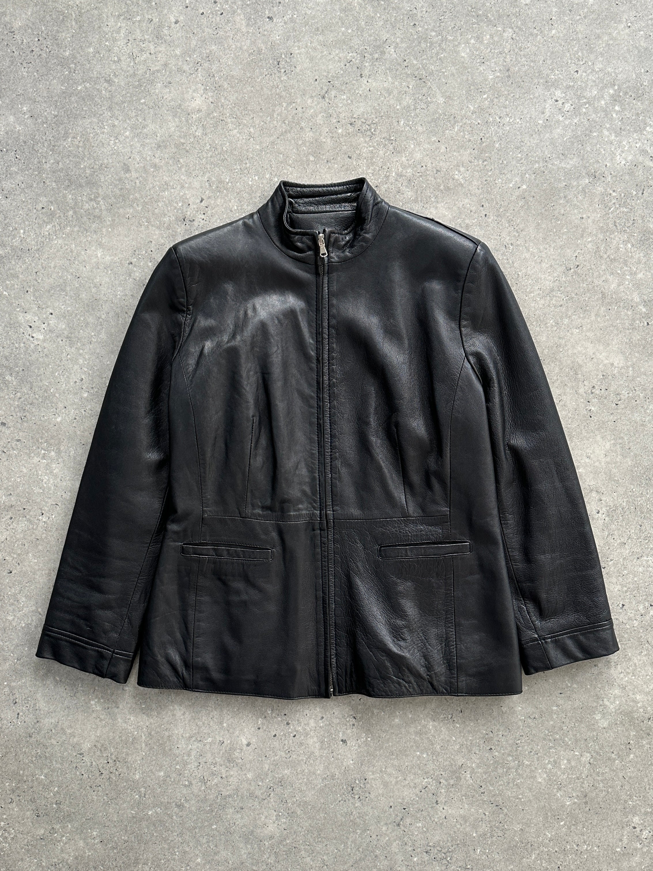Vintage Italian minimal leather jacket in XS/S, showcasing classic design and smooth leather material.