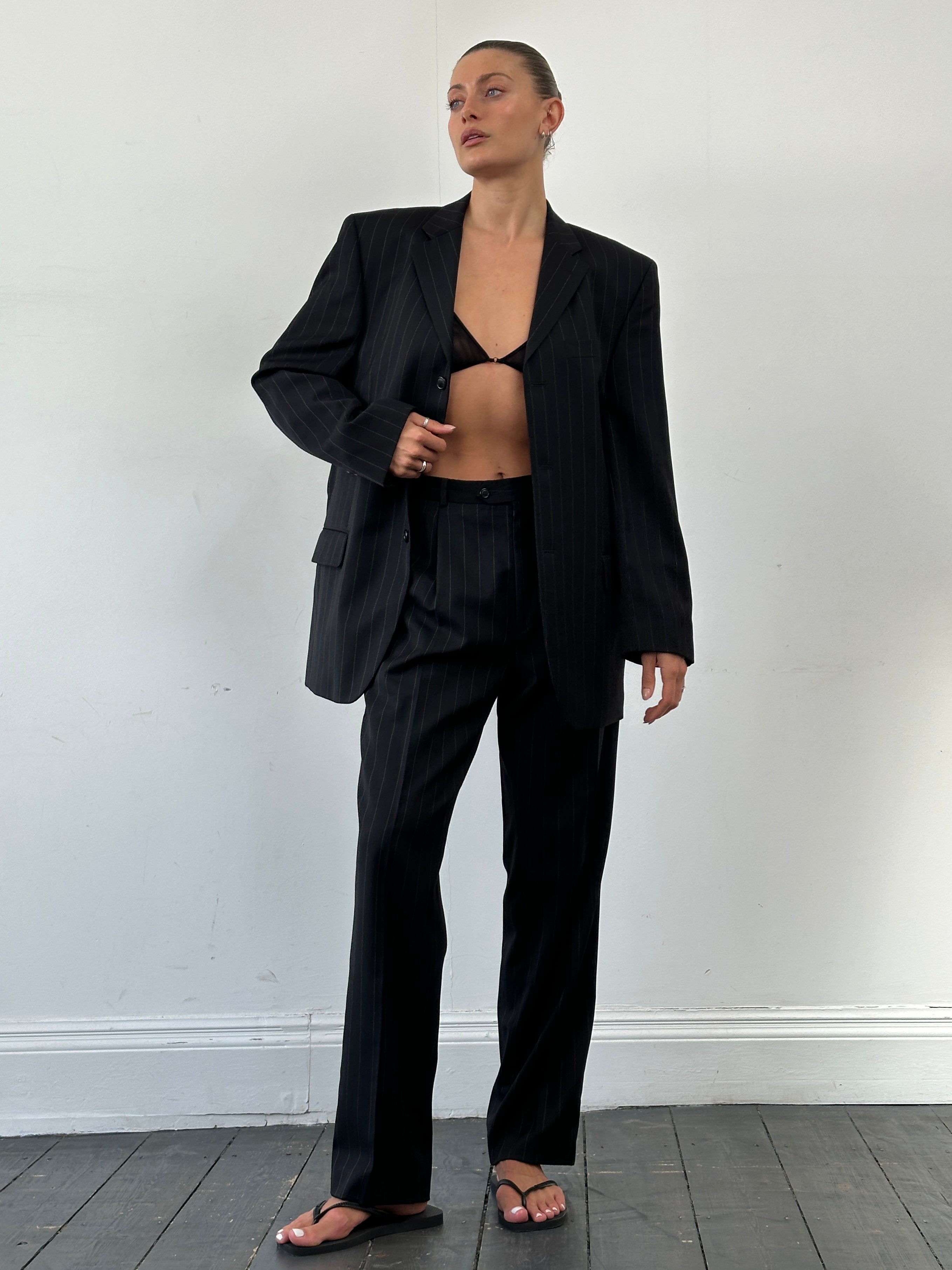 Vintage pure wool pinstripe jumpsuit in size 40R/W34, featuring a single-breasted design with a vintage style.