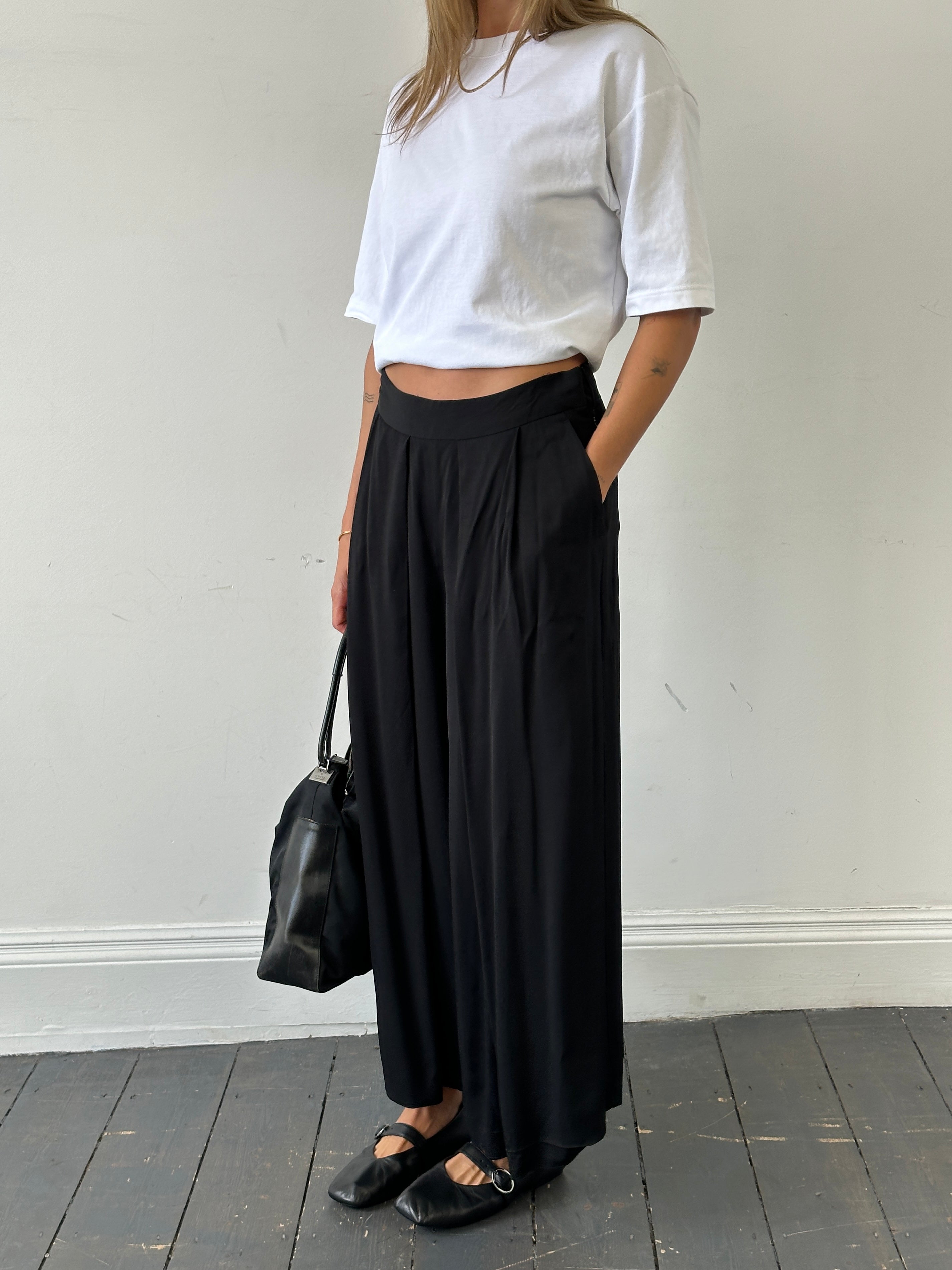 Jigsaw wide-leg pleated culottes shorts in size W28, featuring a high waist and flowing fabric, on a neutral background.
