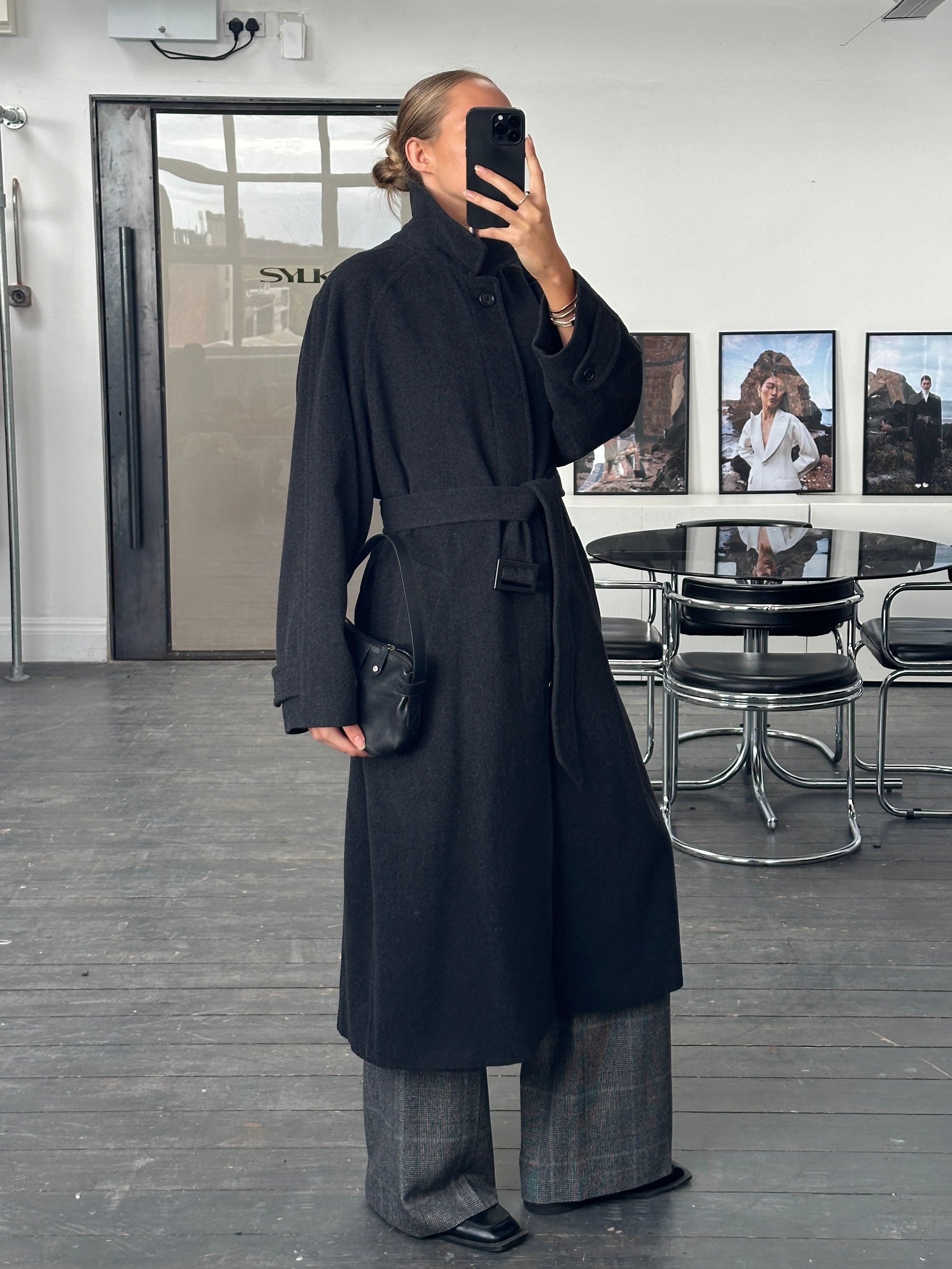 Vintage 1990s wool cashmere belted coat in size L/XL, featuring a classic design and textured fabric, perfect for cold weather.