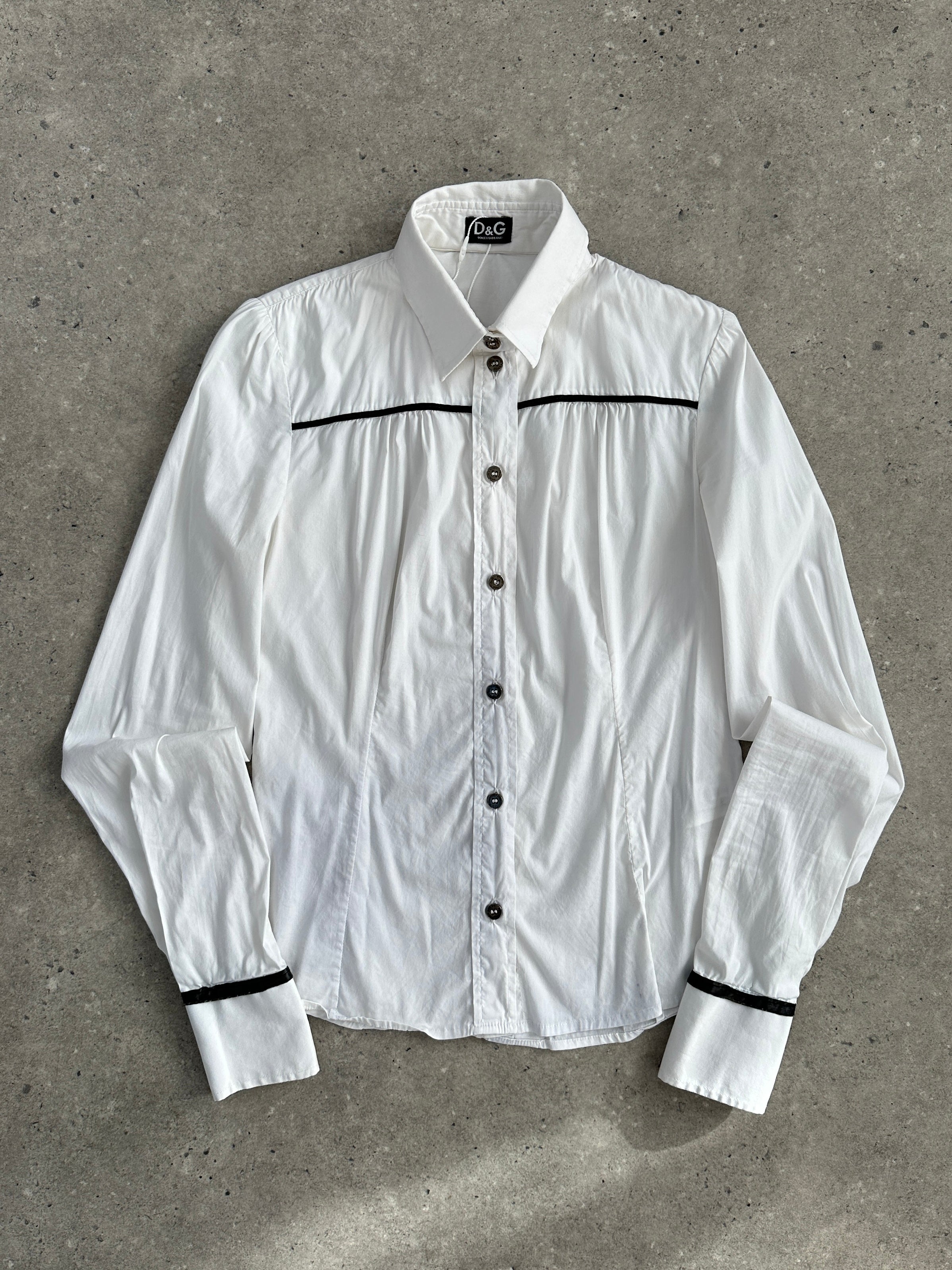 Dolce & Gabbana fitted cotton shirt in XS, featuring classic design and button-up front, displayed on a neutral background.