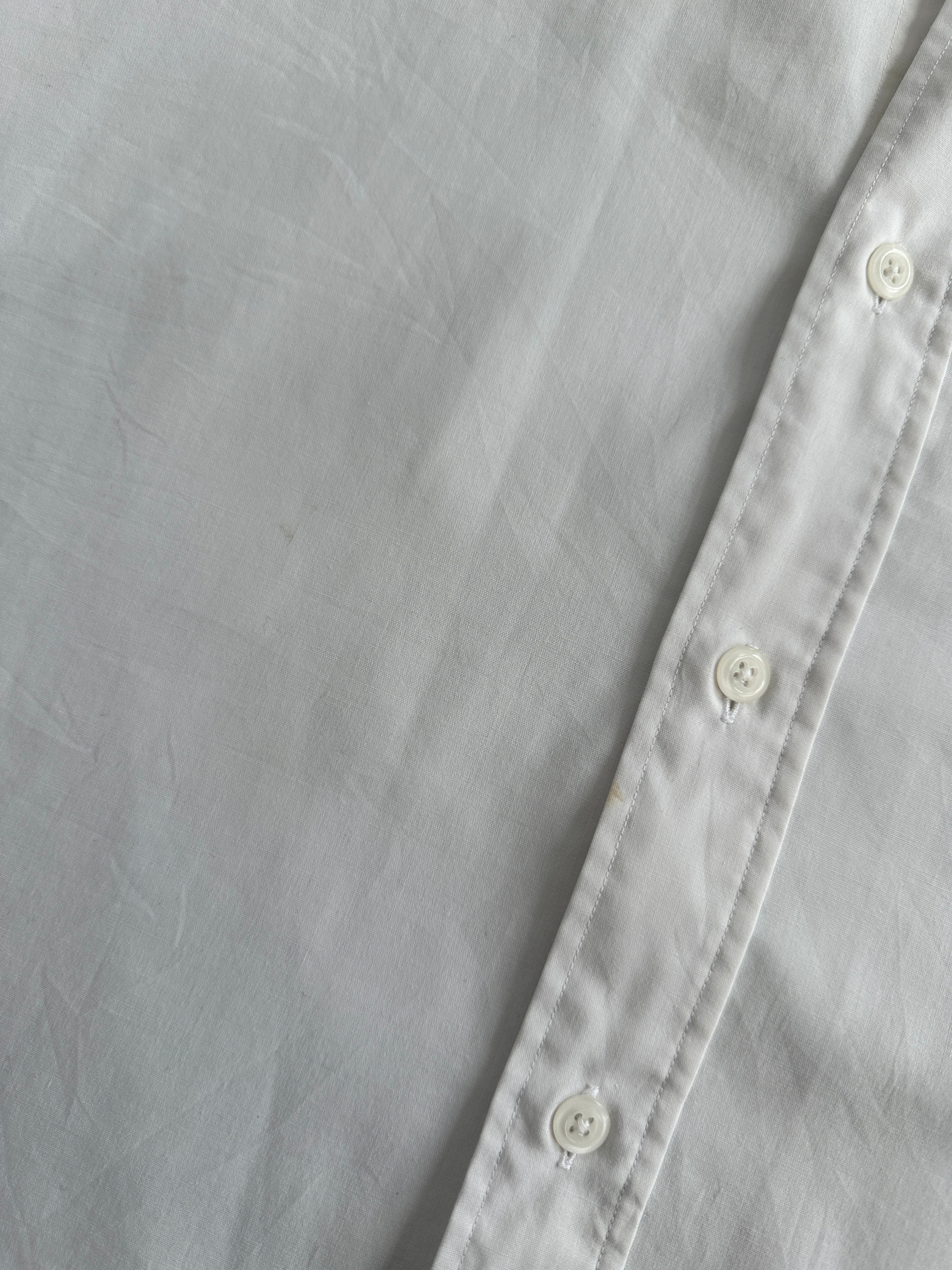 Yves Saint Laurent 90s cotton logo shirt in XL, featuring a classic design with the Yves Saint Laurent branding visible on the front.