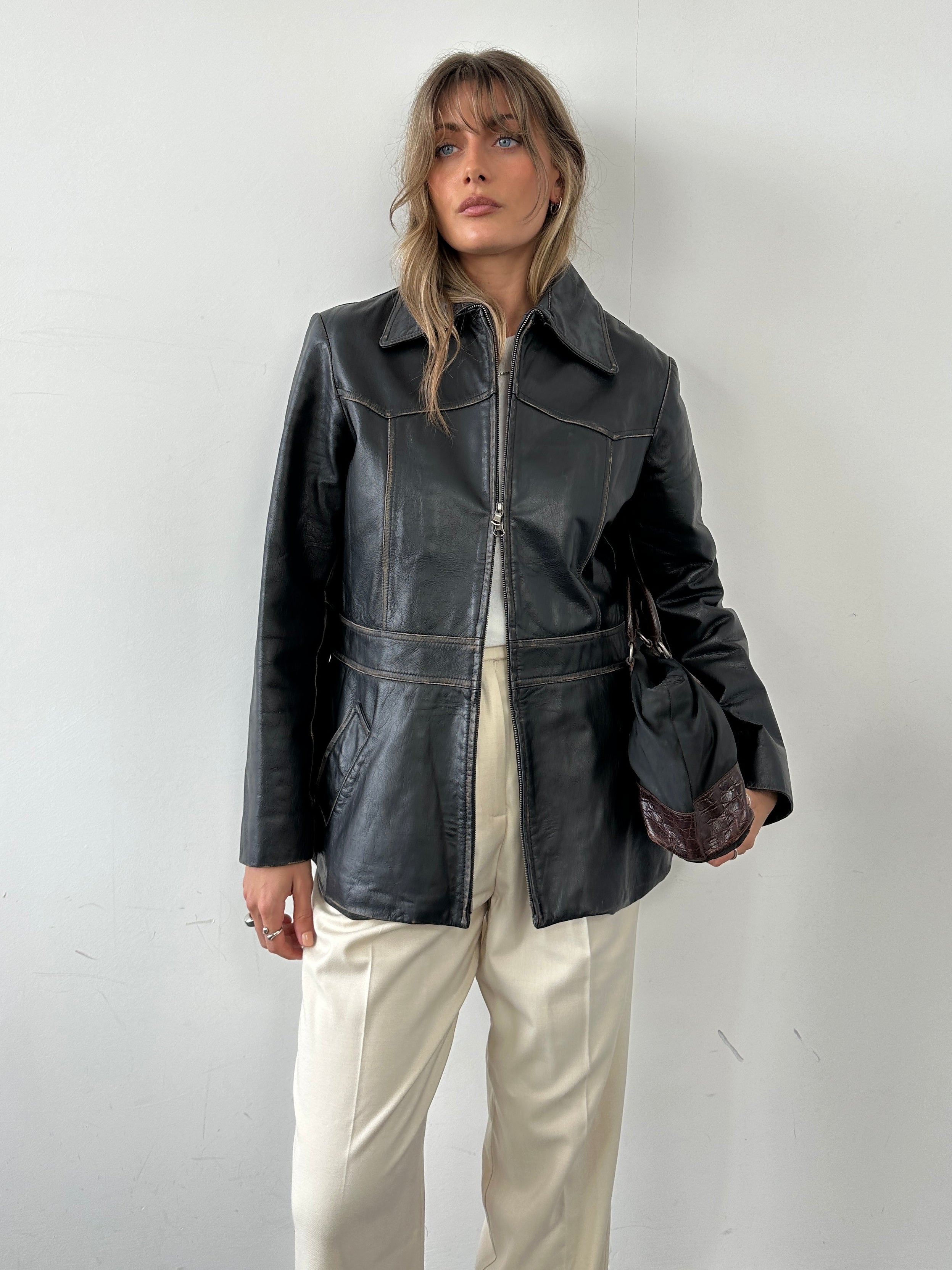 Conbipel double zip waisted leather jacket in size M, stylish black leather jacket with double front zippers and fitted design.