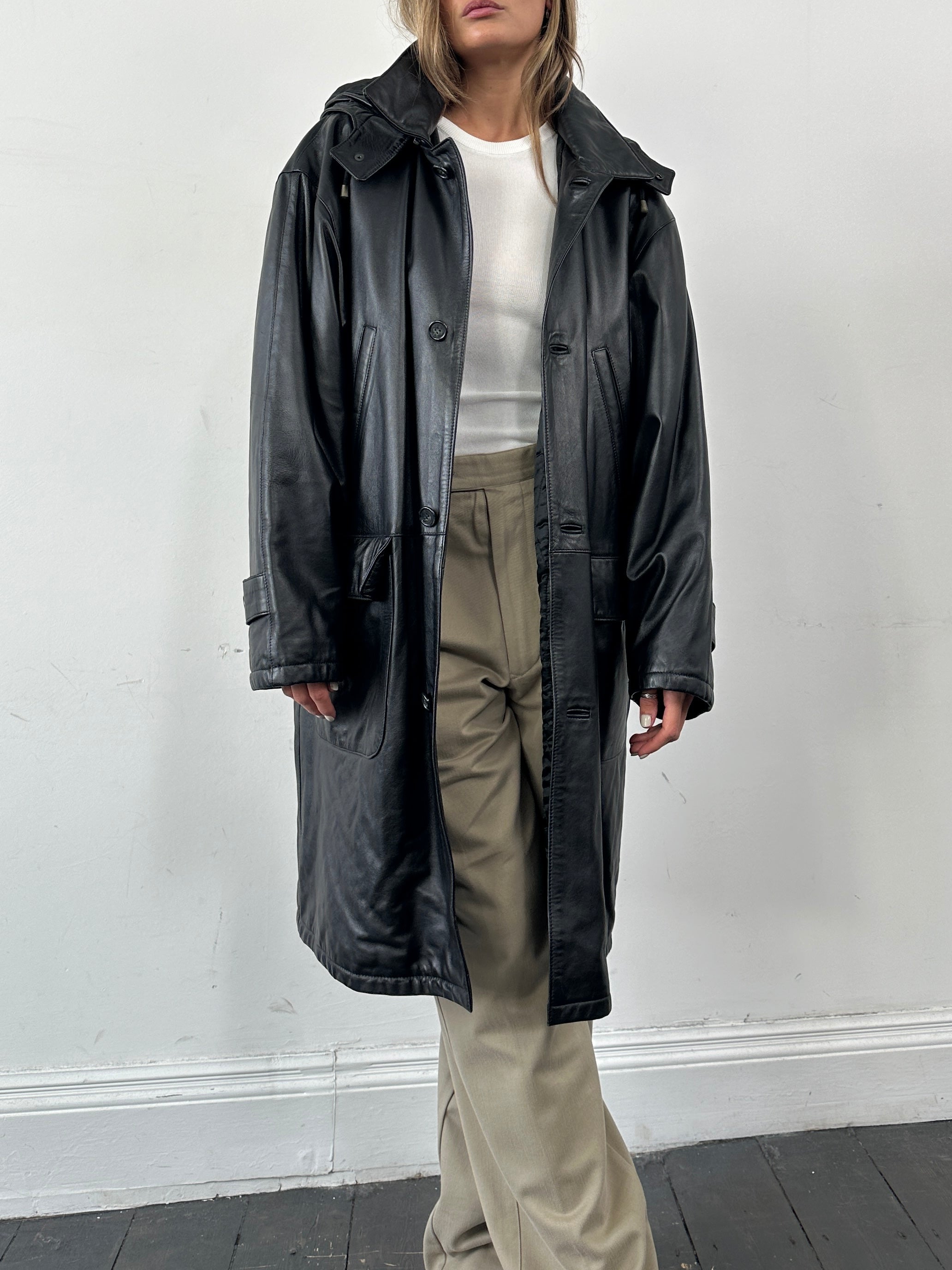 Italian Vintage leather hooded trench coat in XL/XXL, featuring classic design and detailed leather texture.