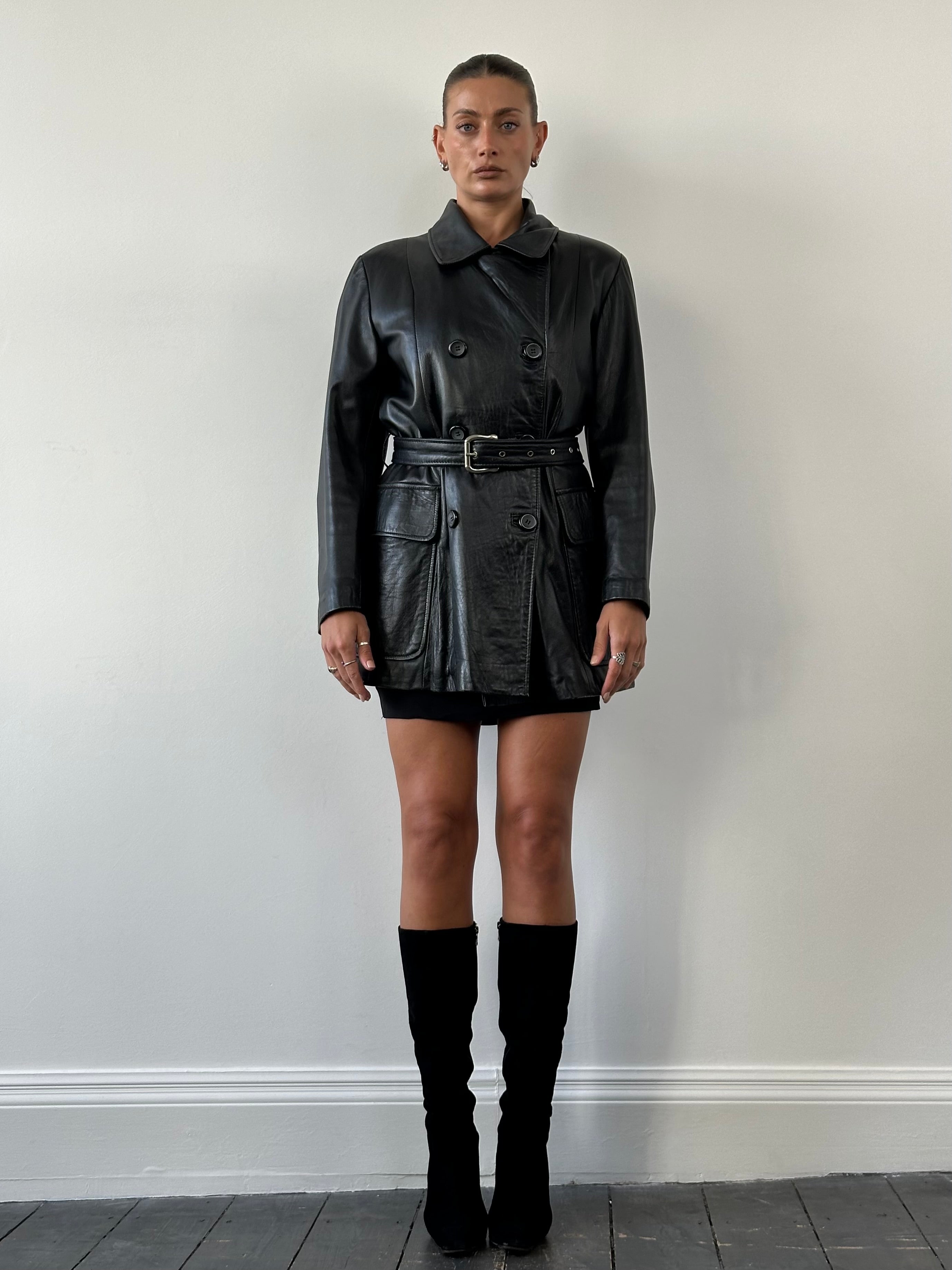 Vintage double-breasted belted leather jacket in smooth leather, size L/XL, featuring classic design and structured fit.