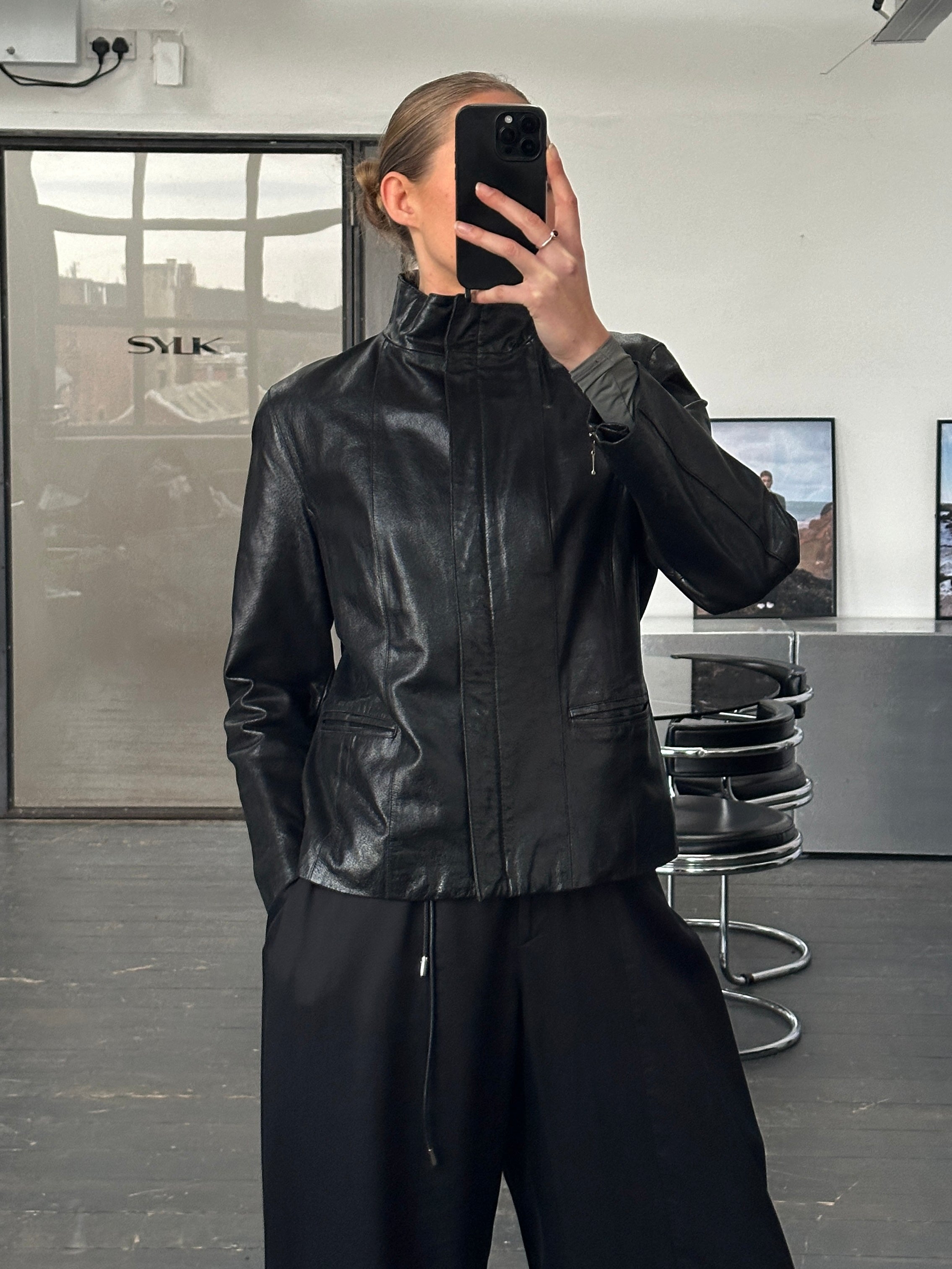 Vintage 1990s high neck leather jacket with double zip closure, black leather, women's size S/M, classic vintage style.