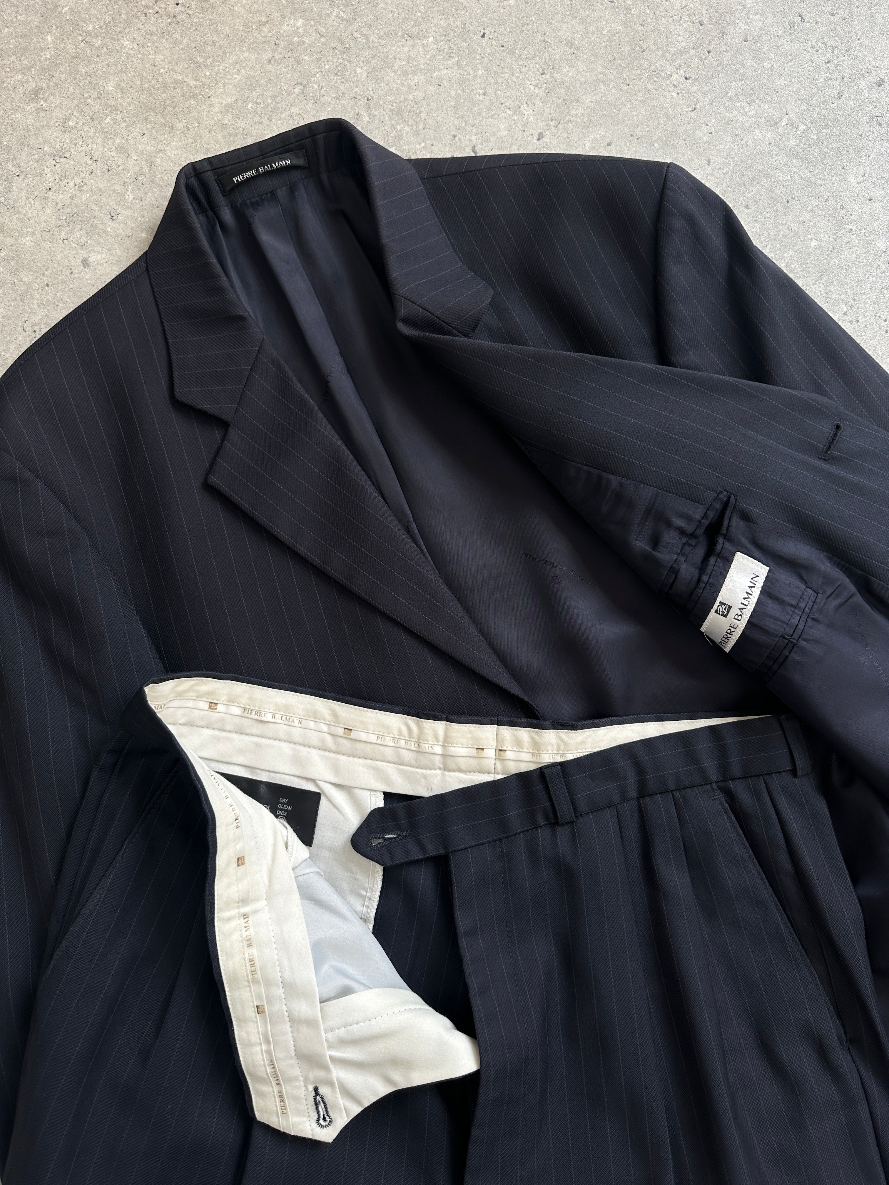 Balmain Pierre Balmain pinstripe pure wool single-breasted jumpsuit, size 40L/W32, featuring tailored design and classic pinstripe pattern.